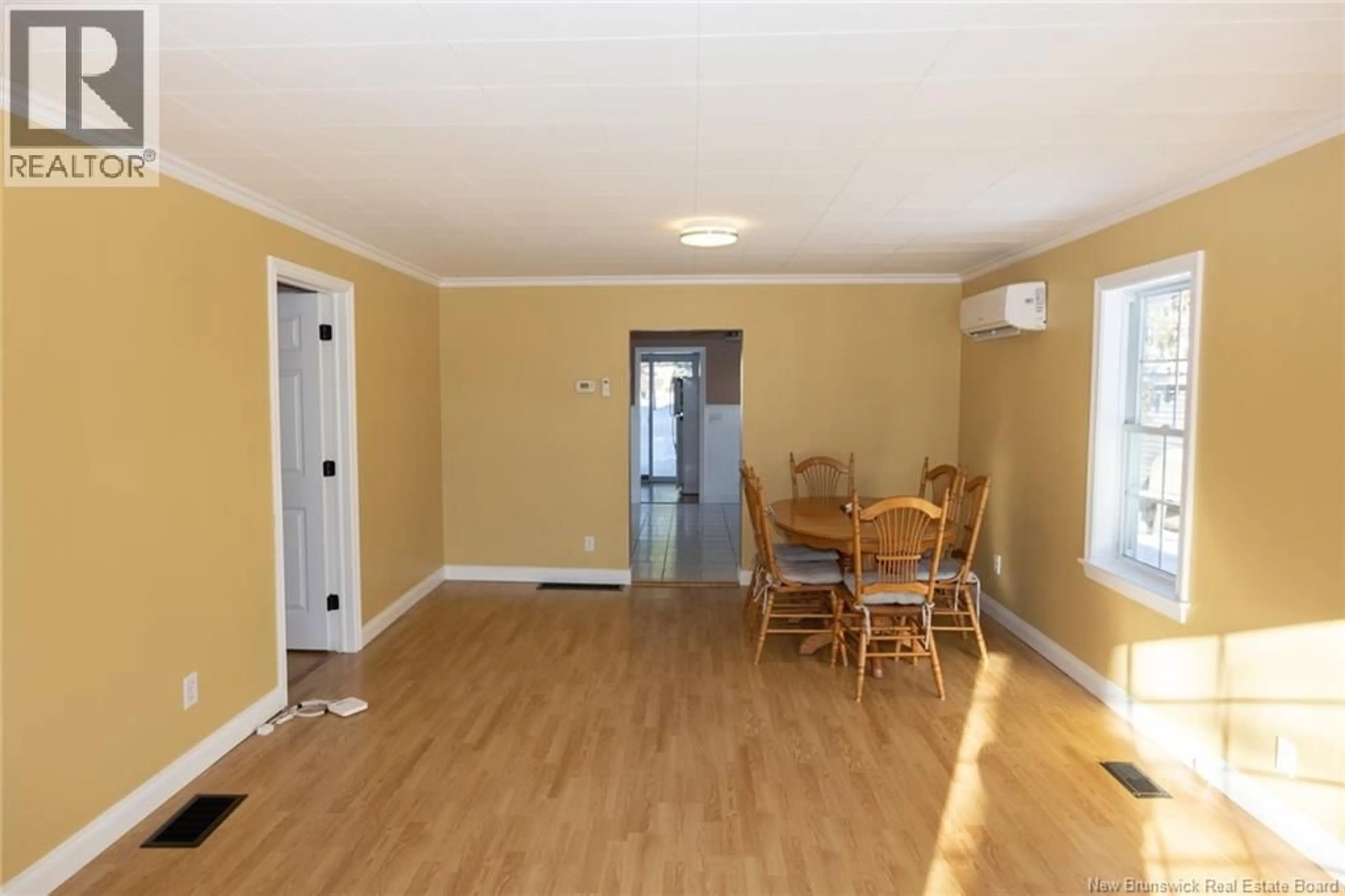 Dining room, wood/laminate floor for 69 WATTERS DRIVE, Fredericton New Brunswick E3A3S9