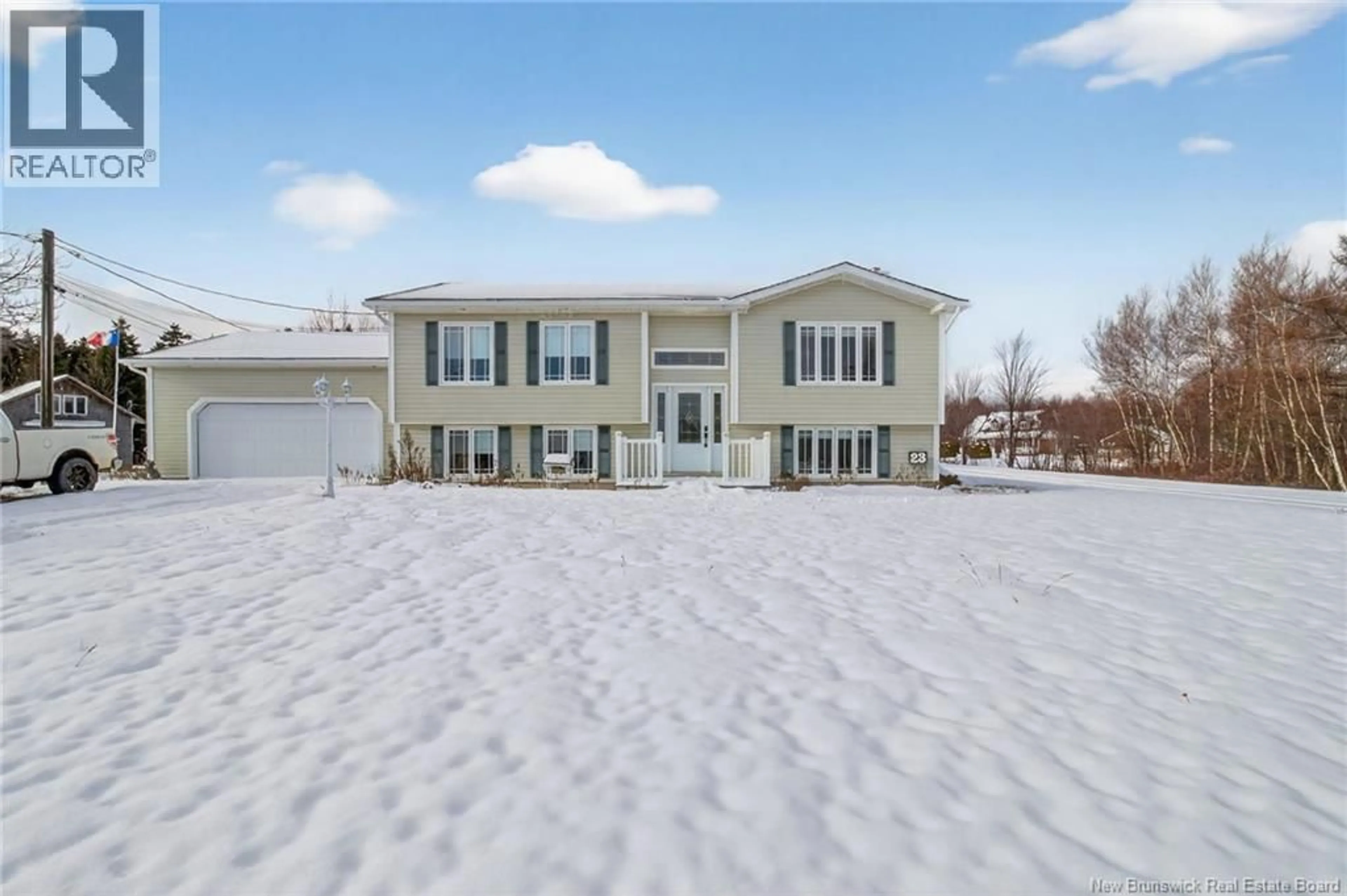 Home with vinyl exterior material, street for 23 LIONEL MAILLET DRIVE, Bouctouche Bay New Brunswick E4S4M5