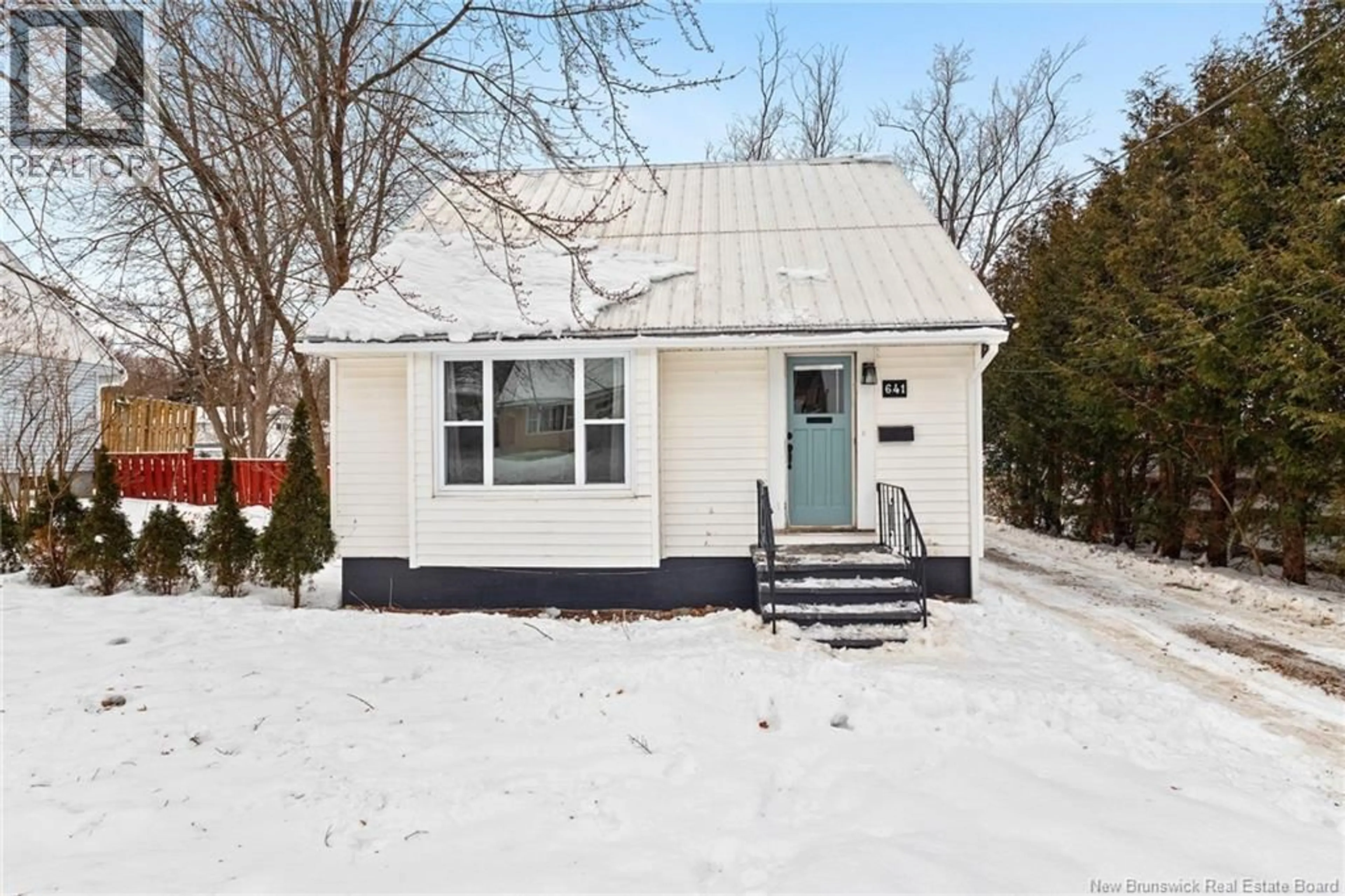 Home with vinyl exterior material, street for 641 REID STREET, Fredericton New Brunswick E2J2C3