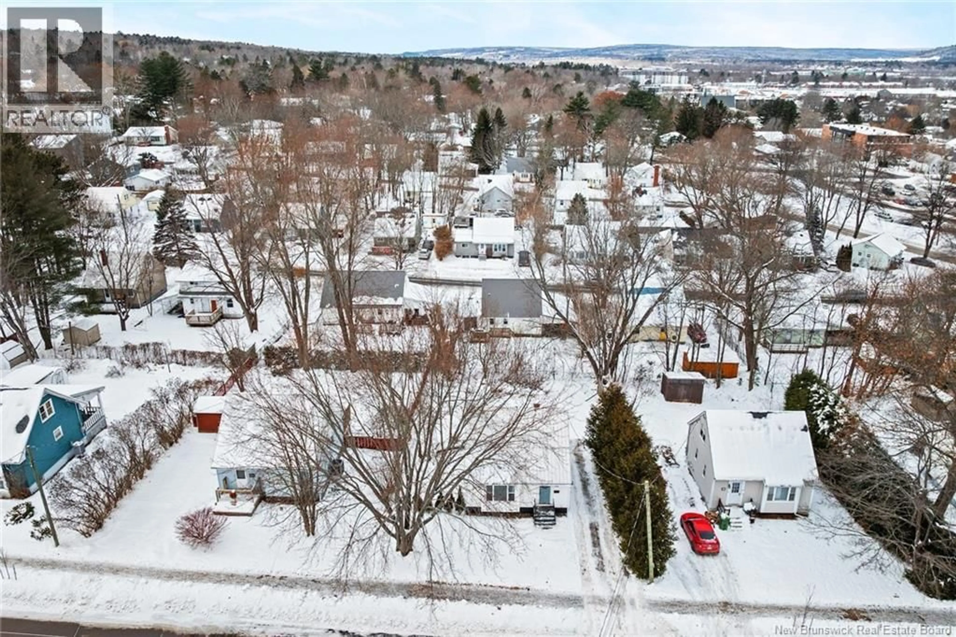 A pic from outside/outdoor area/front of a property/back of a property/a pic from drone, street for 641 REID STREET, Fredericton New Brunswick E2J2C3