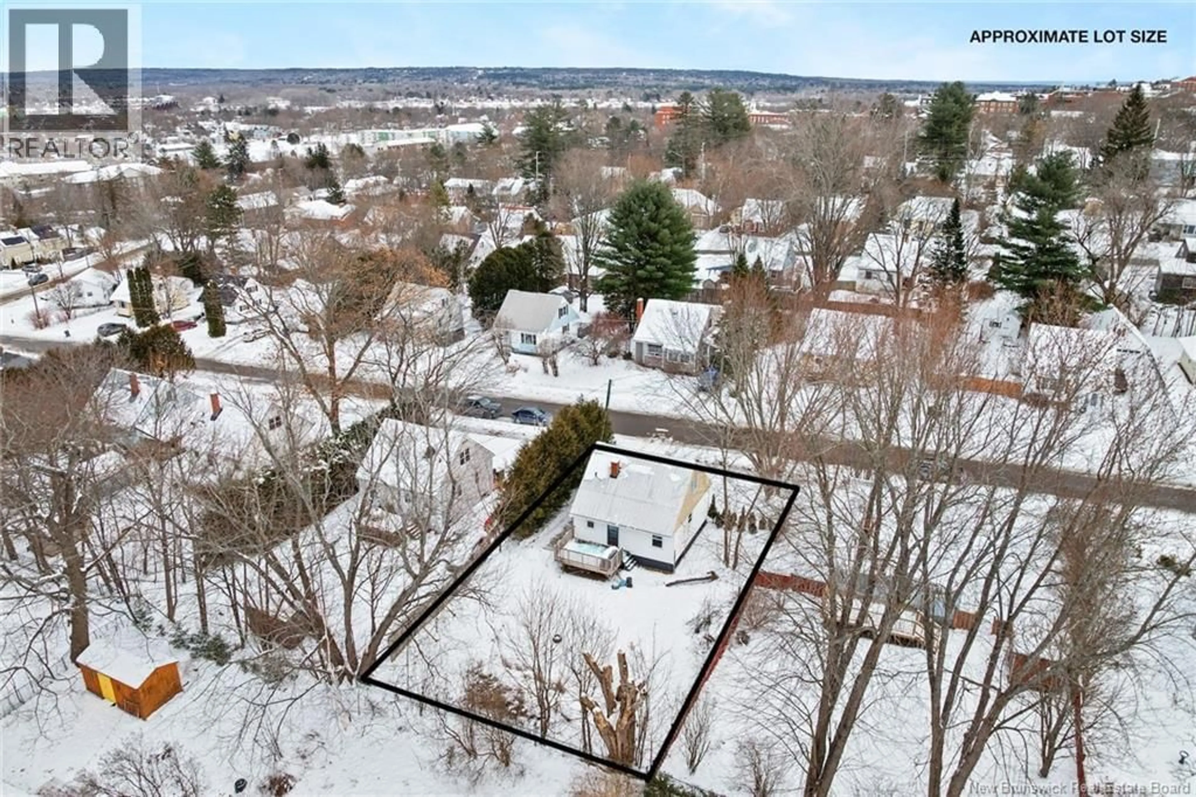 A pic from outside/outdoor area/front of a property/back of a property/a pic from drone, unknown for 641 REID STREET, Fredericton New Brunswick E2J2C3