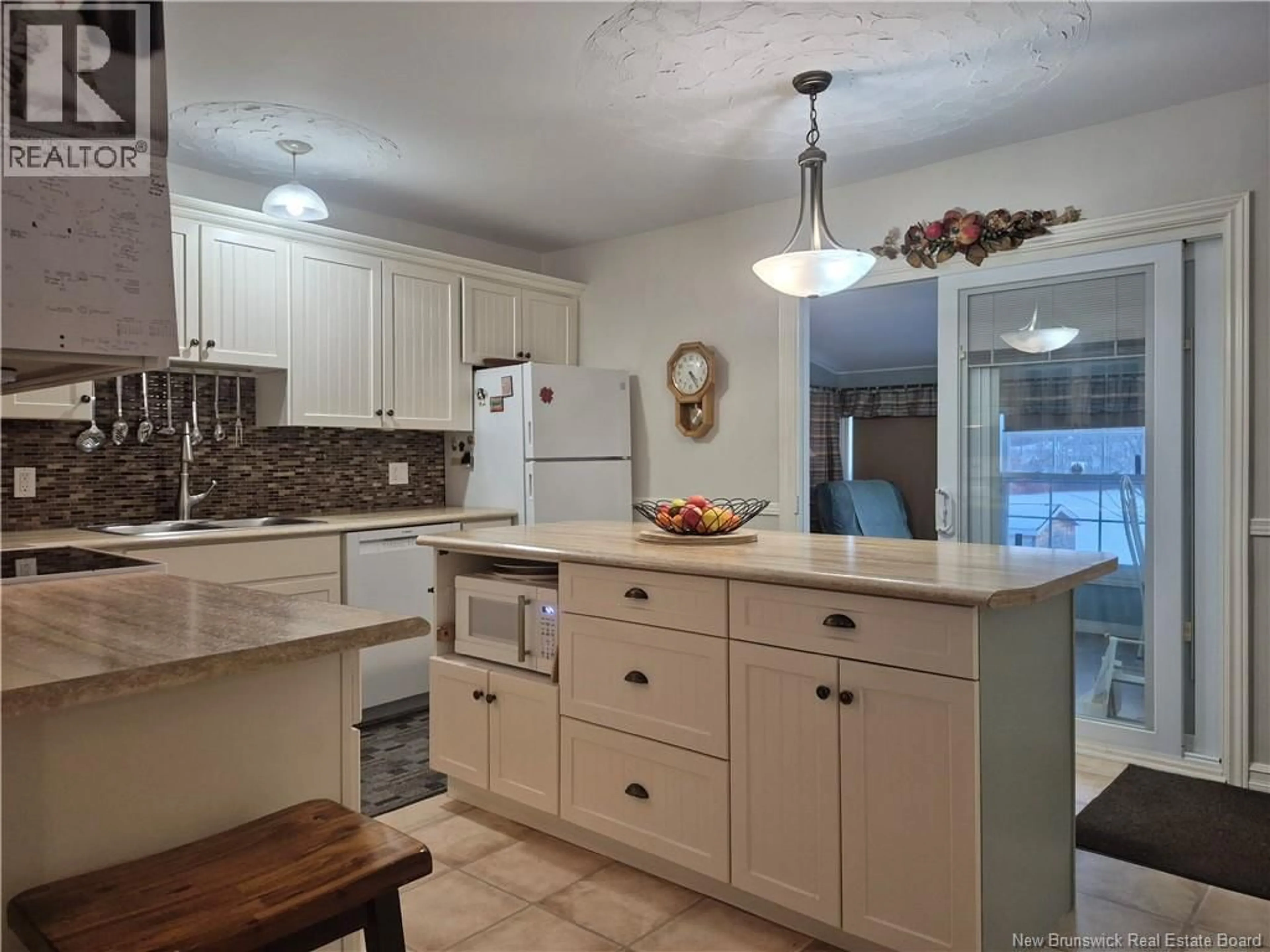 Open concept kitchen, ceramic/tile floor for 318 SUNSET, Beresford New Brunswick E8K2G6