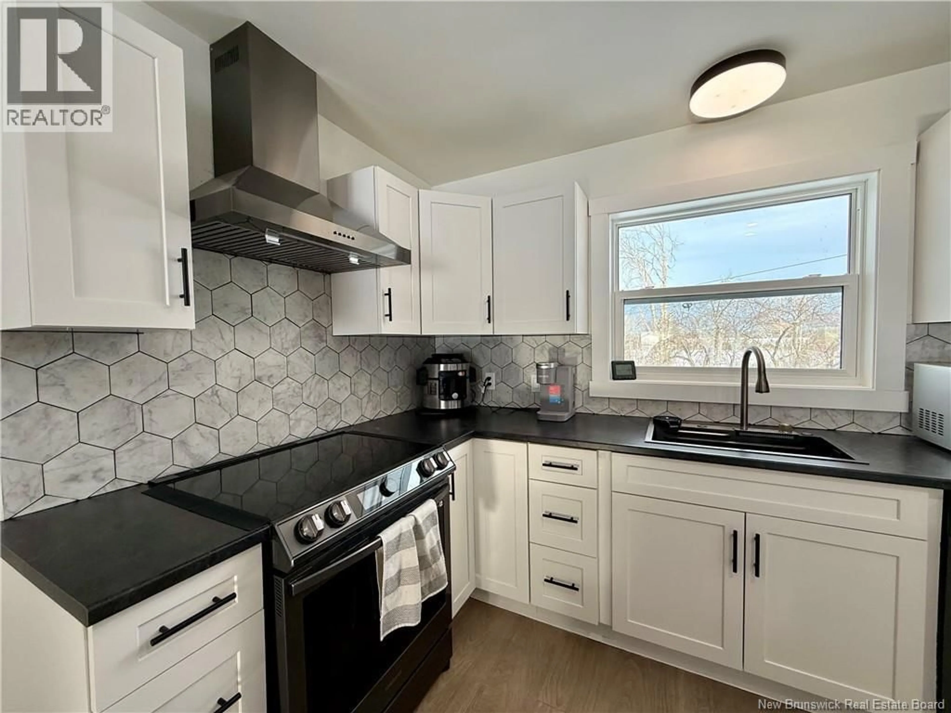 Open concept kitchen, ceramic/tile floor for 400 RTE 420, South Esk New Brunswick E1V3M3