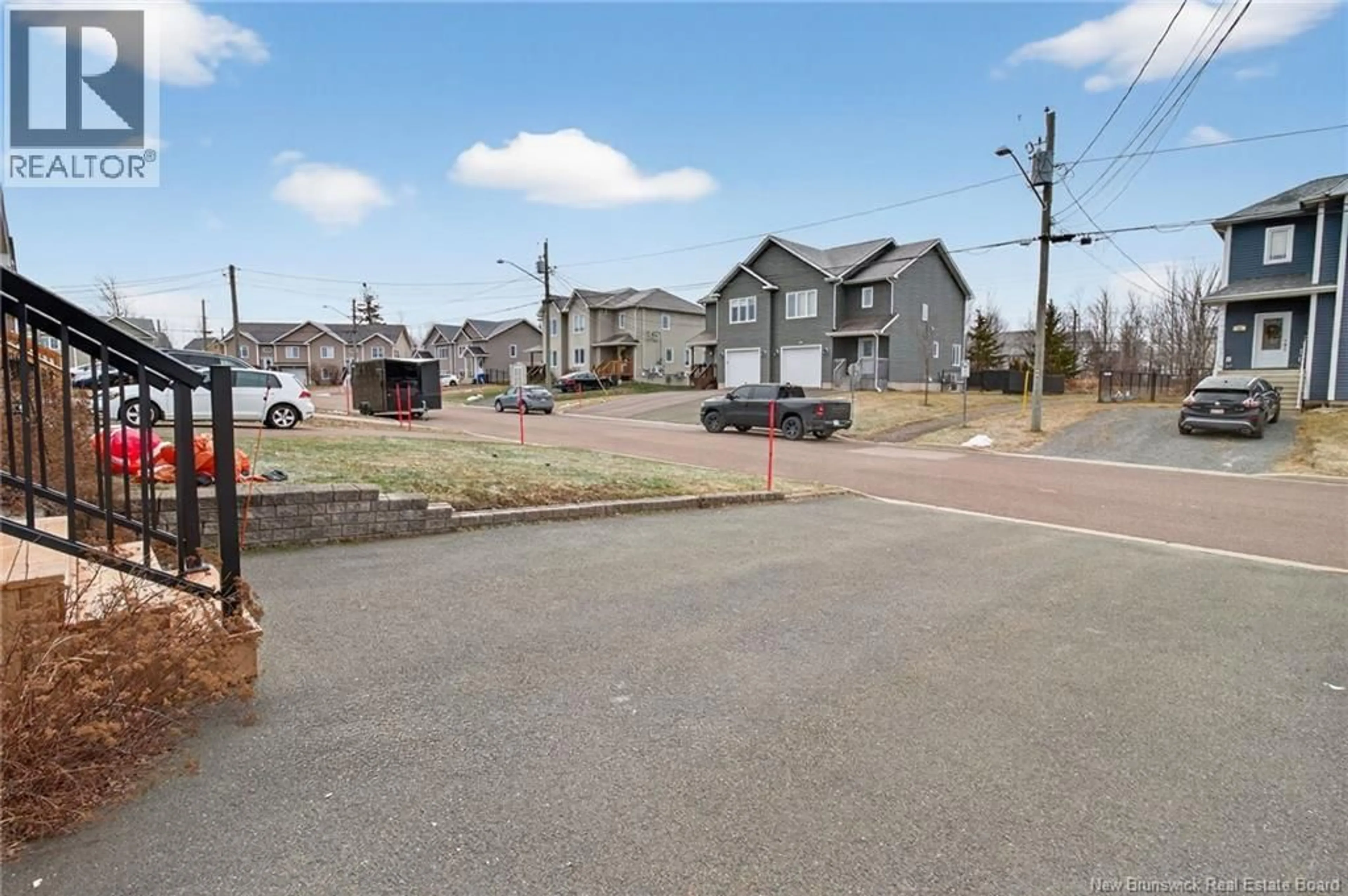 A pic from outside/outdoor area/front of a property/back of a property/a pic from drone, street for 55 JASMINE, Moncton New Brunswick E1A9A5