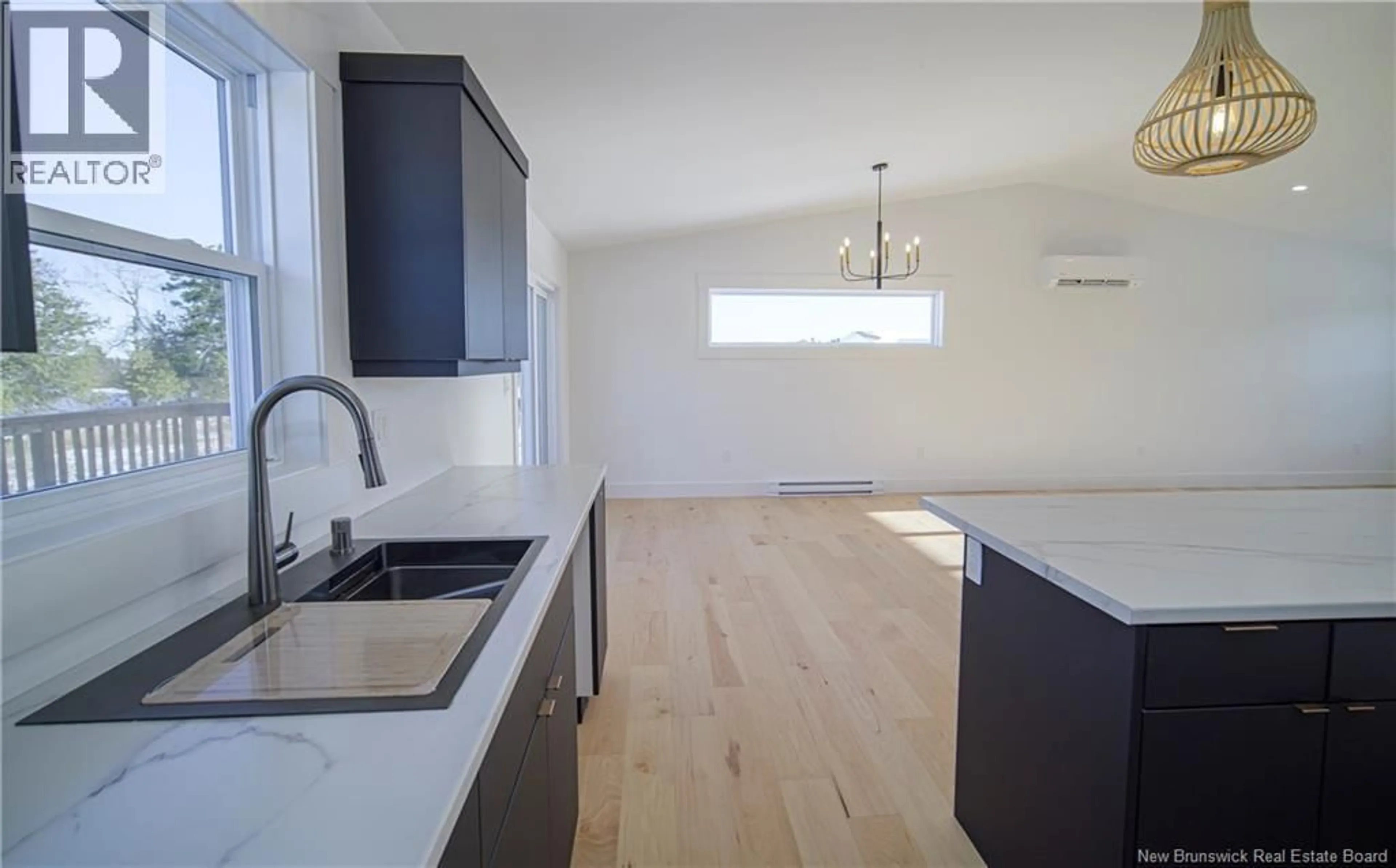 Open concept kitchen, wood/laminate floor for 41 ROSIE STREET, Upper Kingsclear New Brunswick E3E0H8