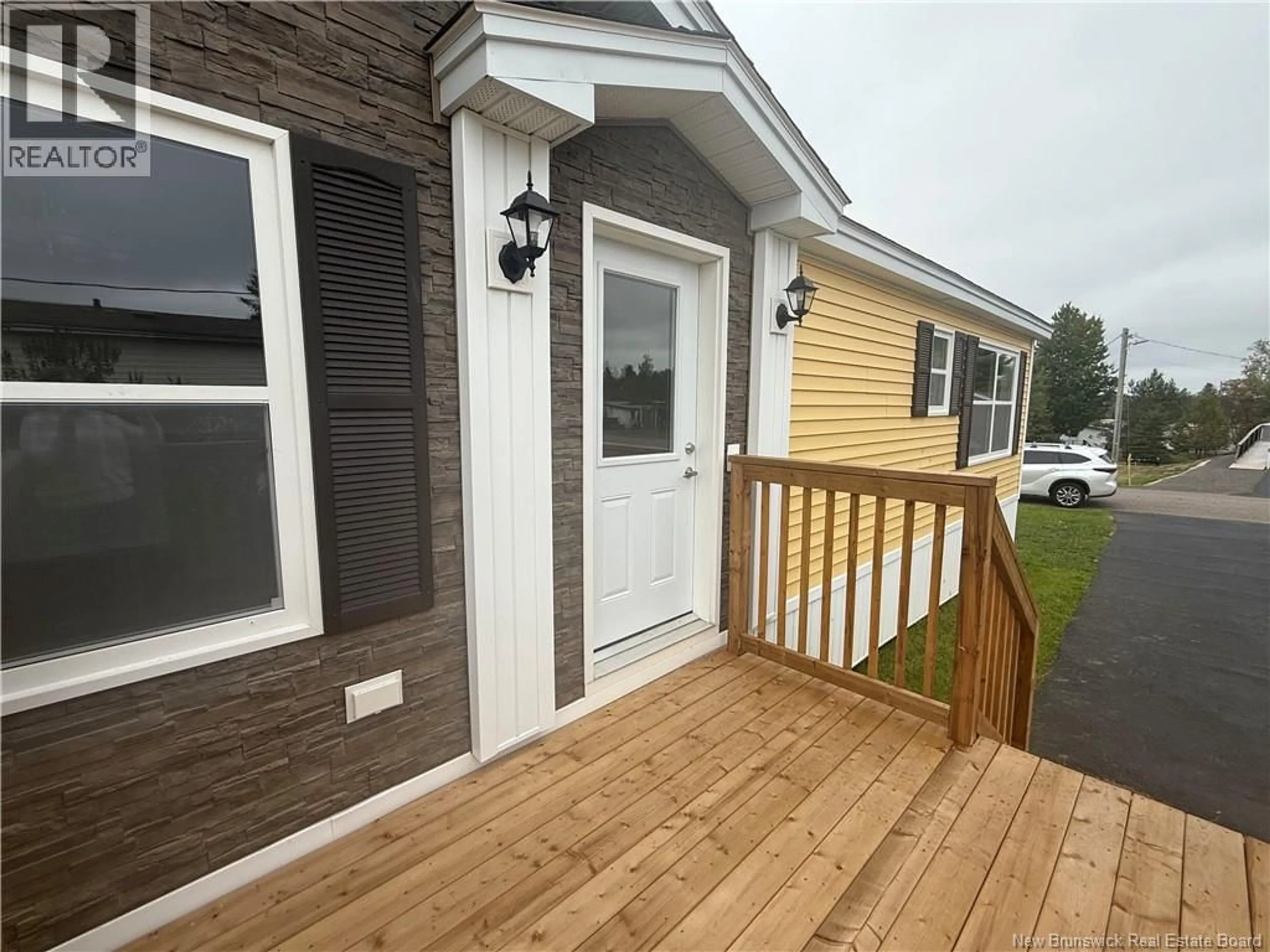 Home with vinyl exterior material, street for 11 ORCHARD CRESCENT, Picadilly New Brunswick E4E3X5