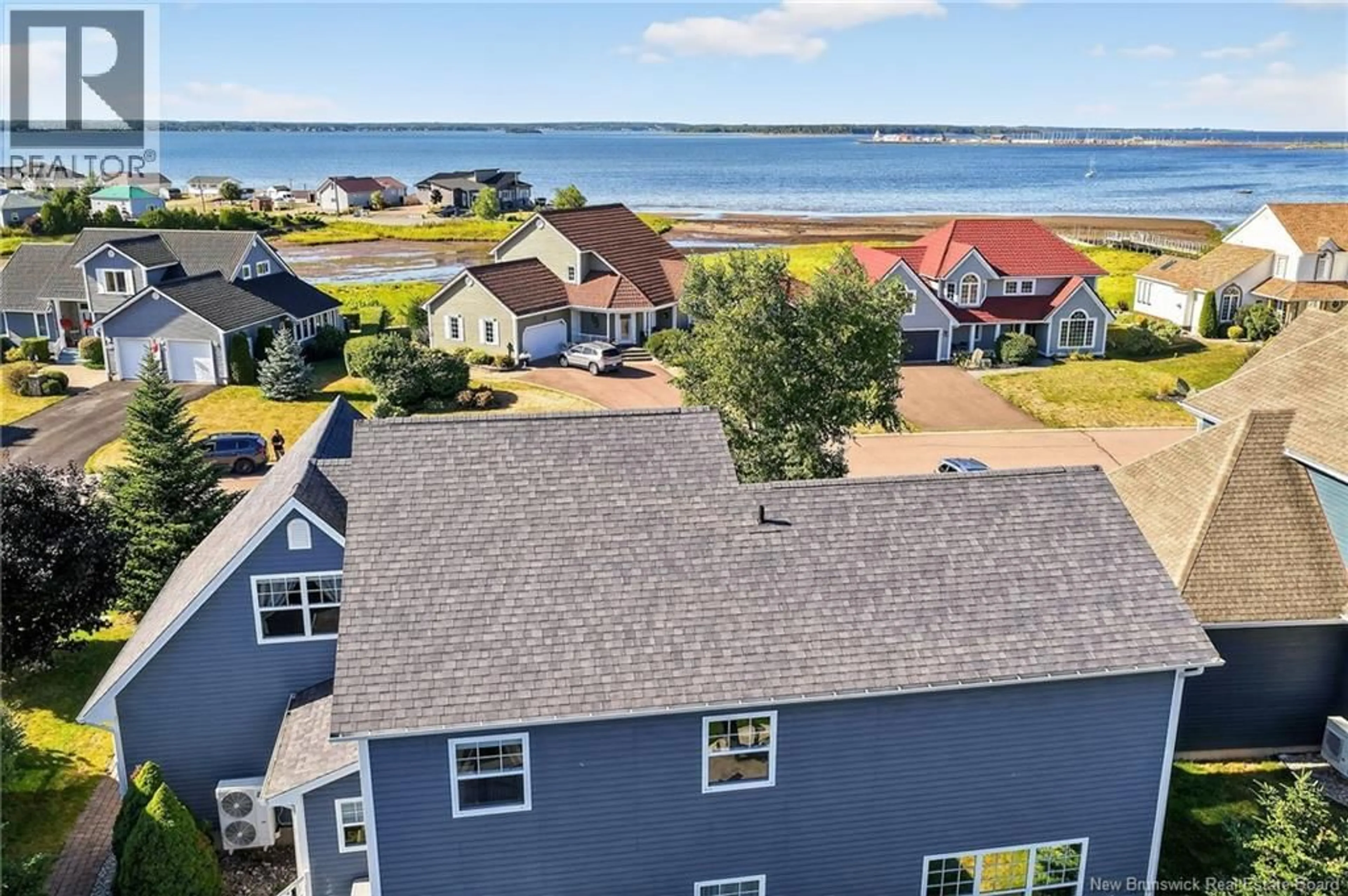 A pic from outside/outdoor area/front of a property/back of a property/a pic from drone, water/lake/river/ocean view for 499 WAYNE STREET, Shediac New Brunswick E4P2W8