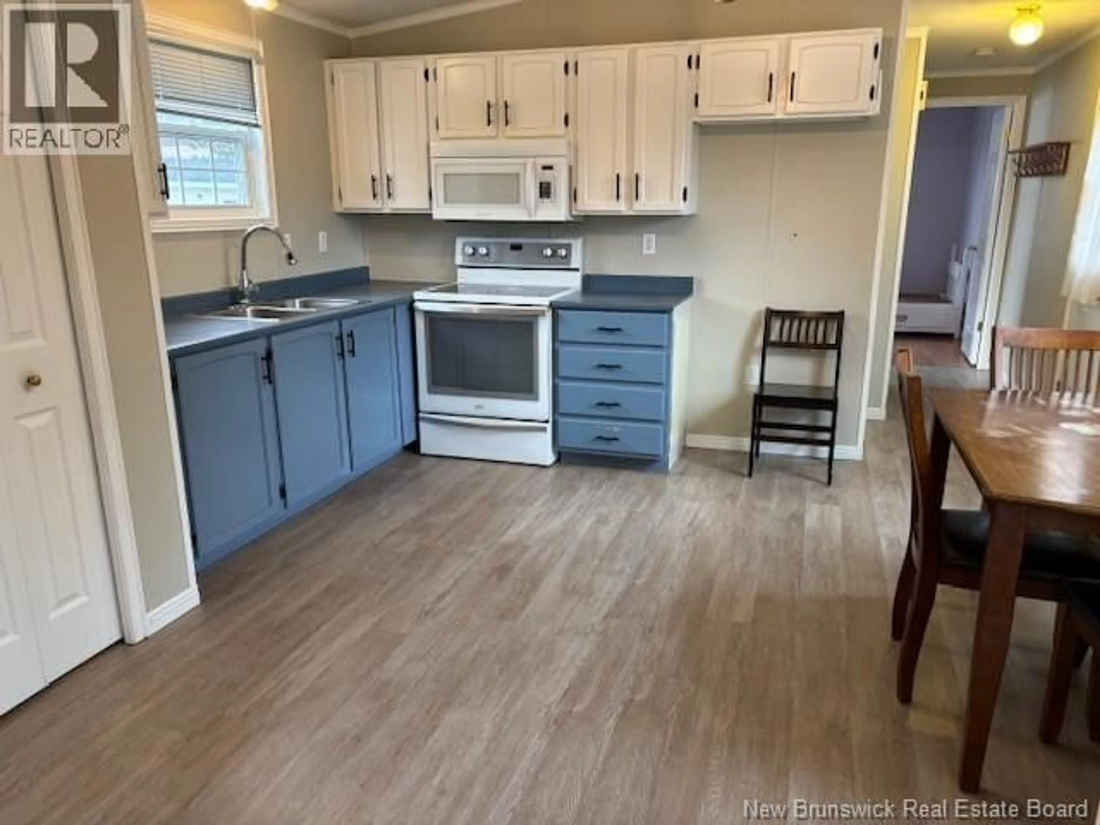 Open concept kitchen, wood/laminate floor for 537 ROUTE 890, Smiths Creek New Brunswick E4G2S9