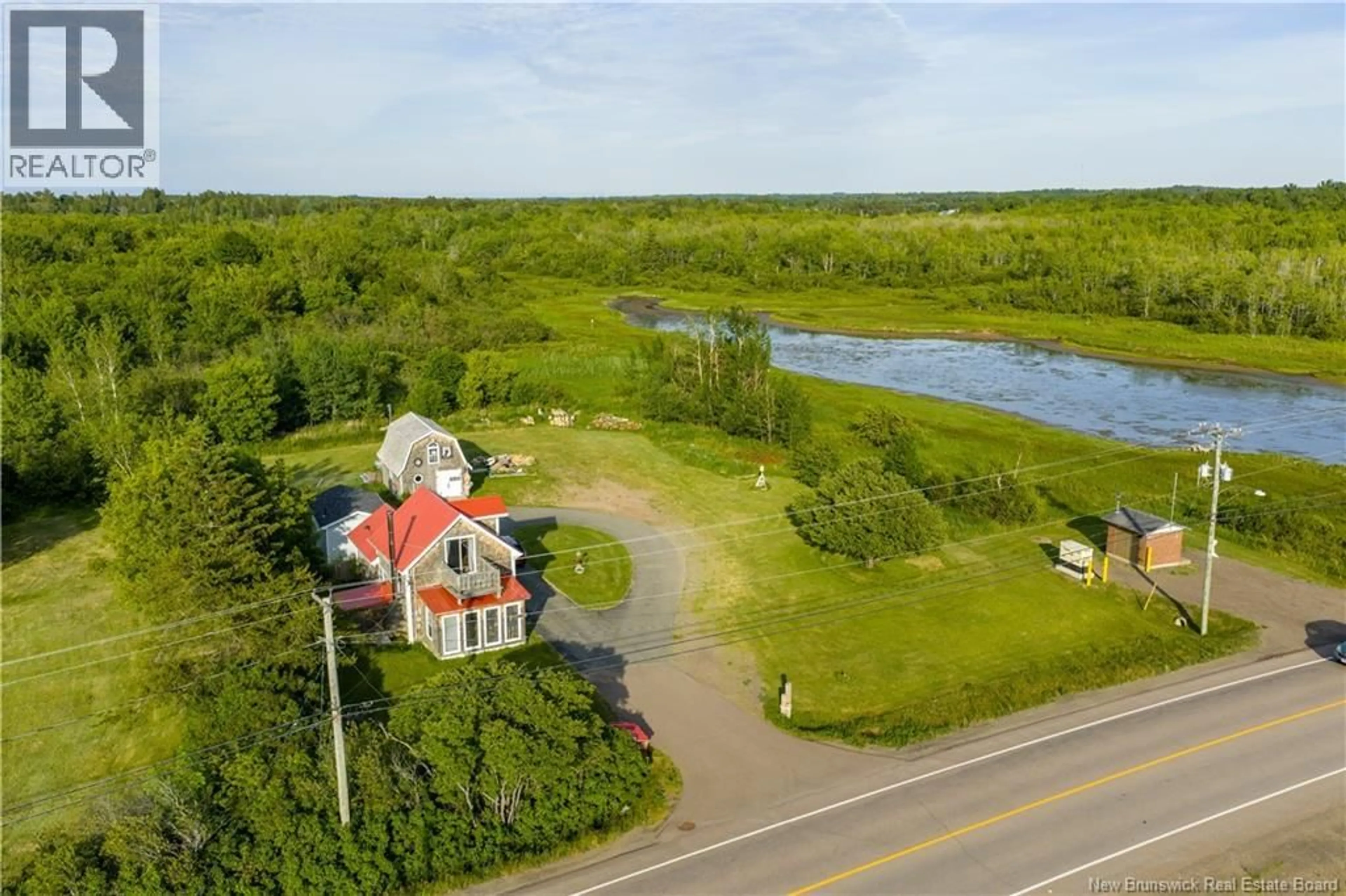 A pic from outside/outdoor area/front of a property/back of a property/a pic from drone, water/lake/river/ocean view for 137 POINTE DU CHENE ROAD, Pointe-Du-Chêne New Brunswick E4P4S9