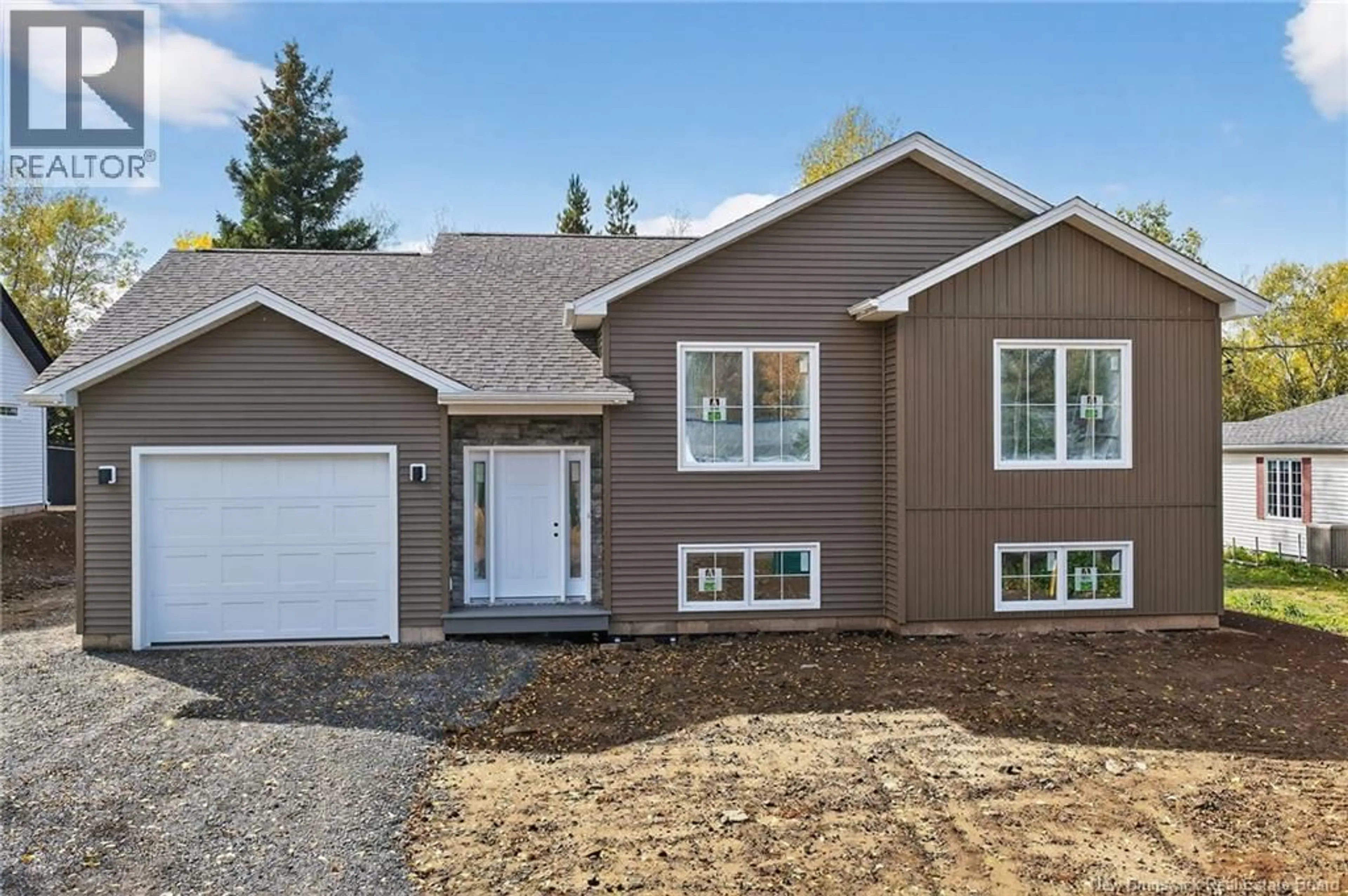 Home with vinyl exterior material, street for 141 CARTIER, Shediac New Brunswick E4P1L3