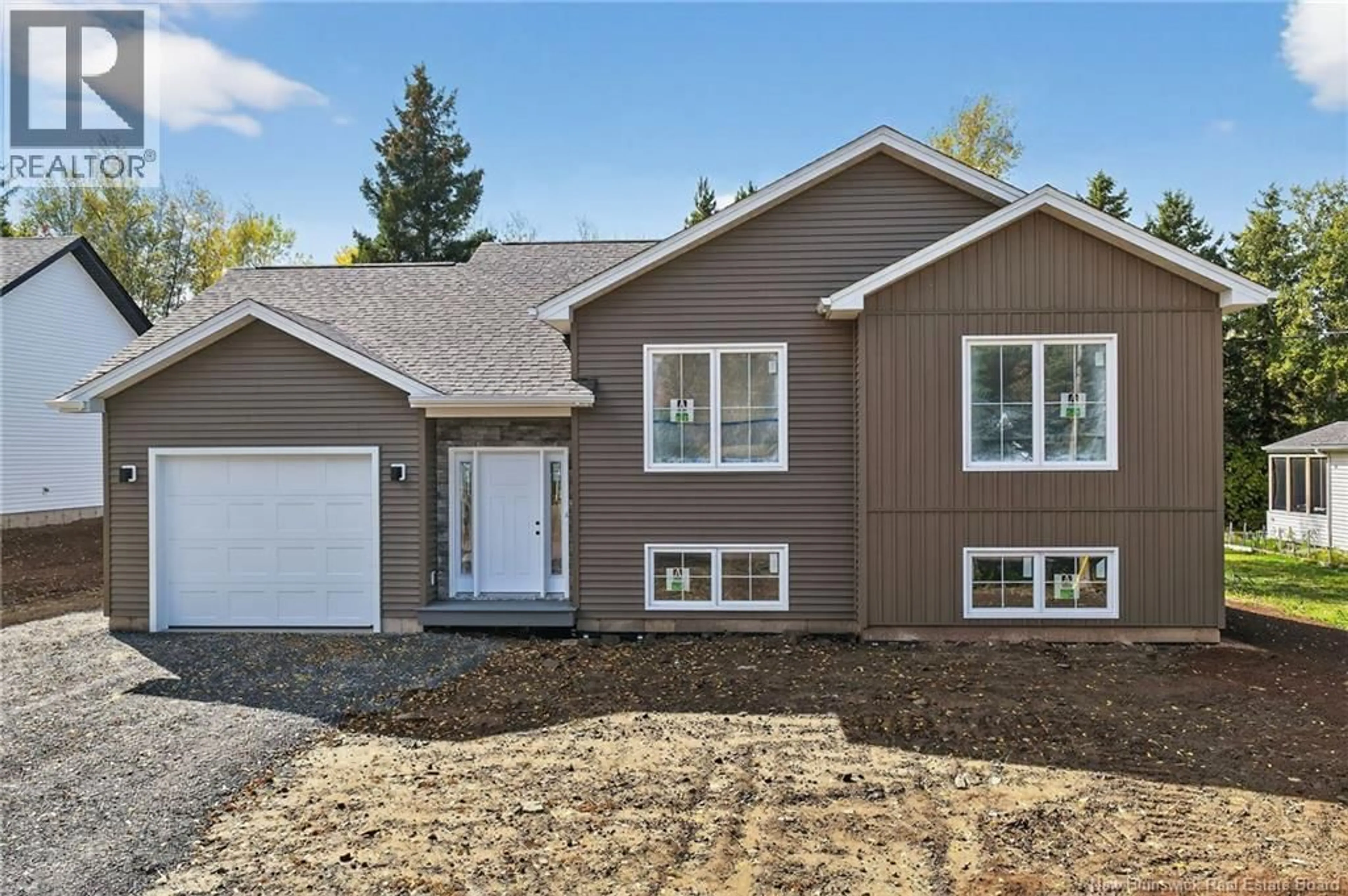 Home with vinyl exterior material, street for 141 CARTIER, Shediac New Brunswick E4P1L3