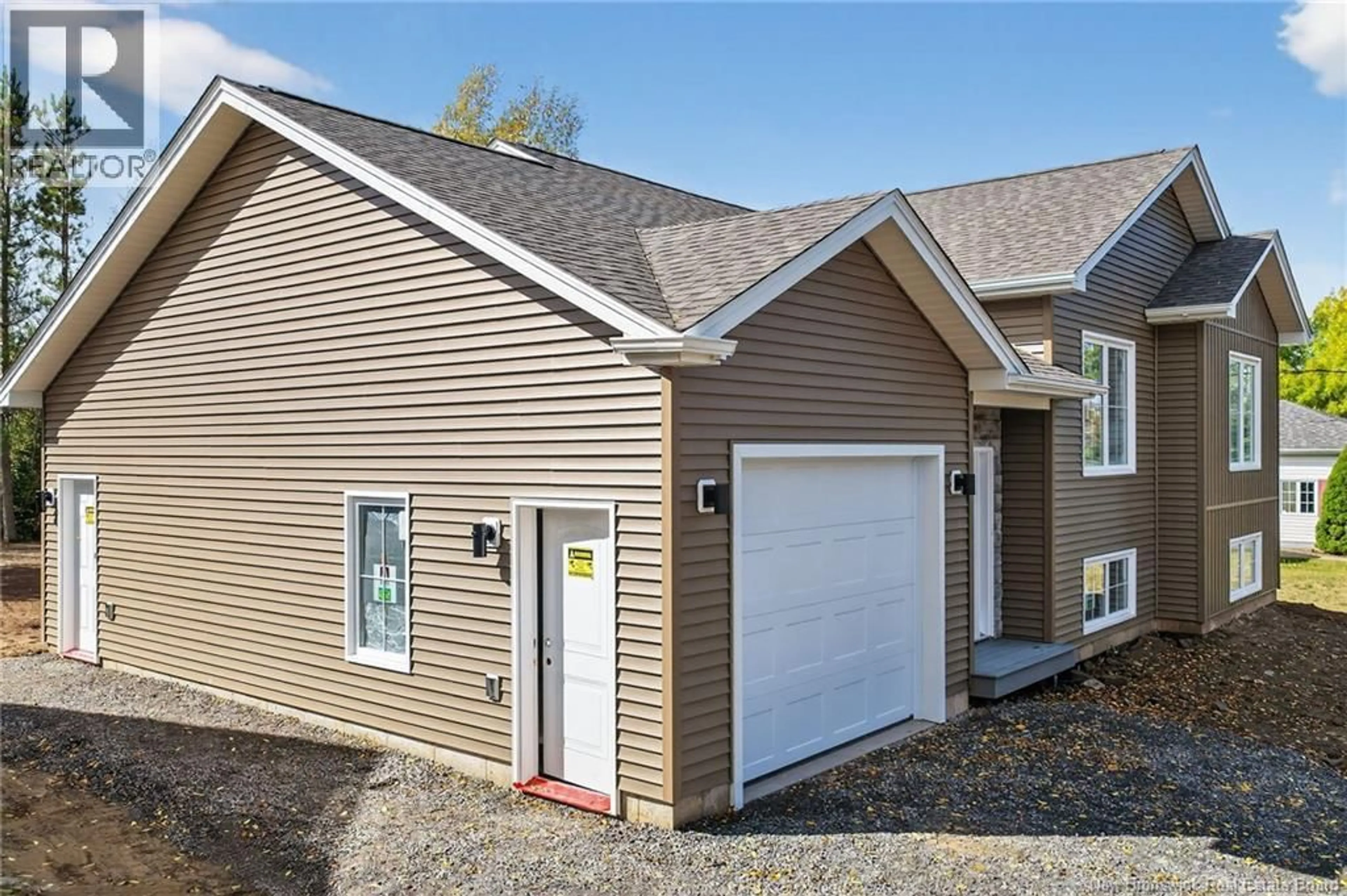 Home with vinyl exterior material, street for 141 CARTIER, Shediac New Brunswick E4P1L3