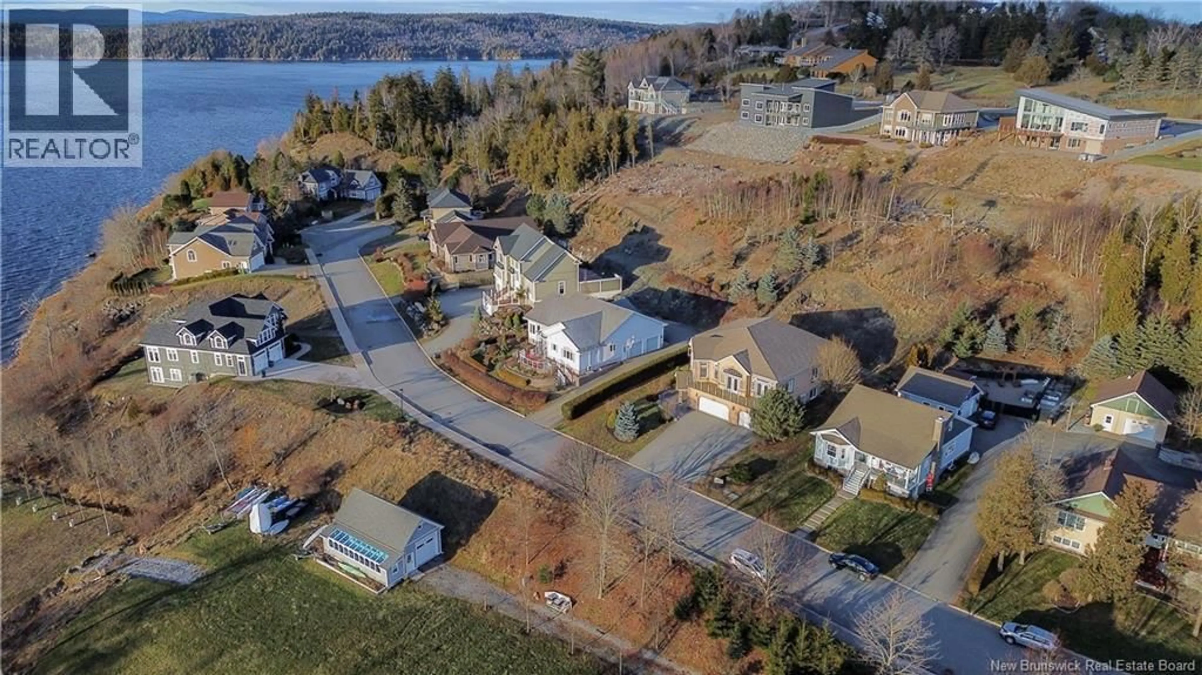 A pic from outside/outdoor area/front of a property/back of a property/a pic from drone, water/lake/river/ocean view for 20 BRIGADOON TERRACE, Saint John New Brunswick E2K5H5