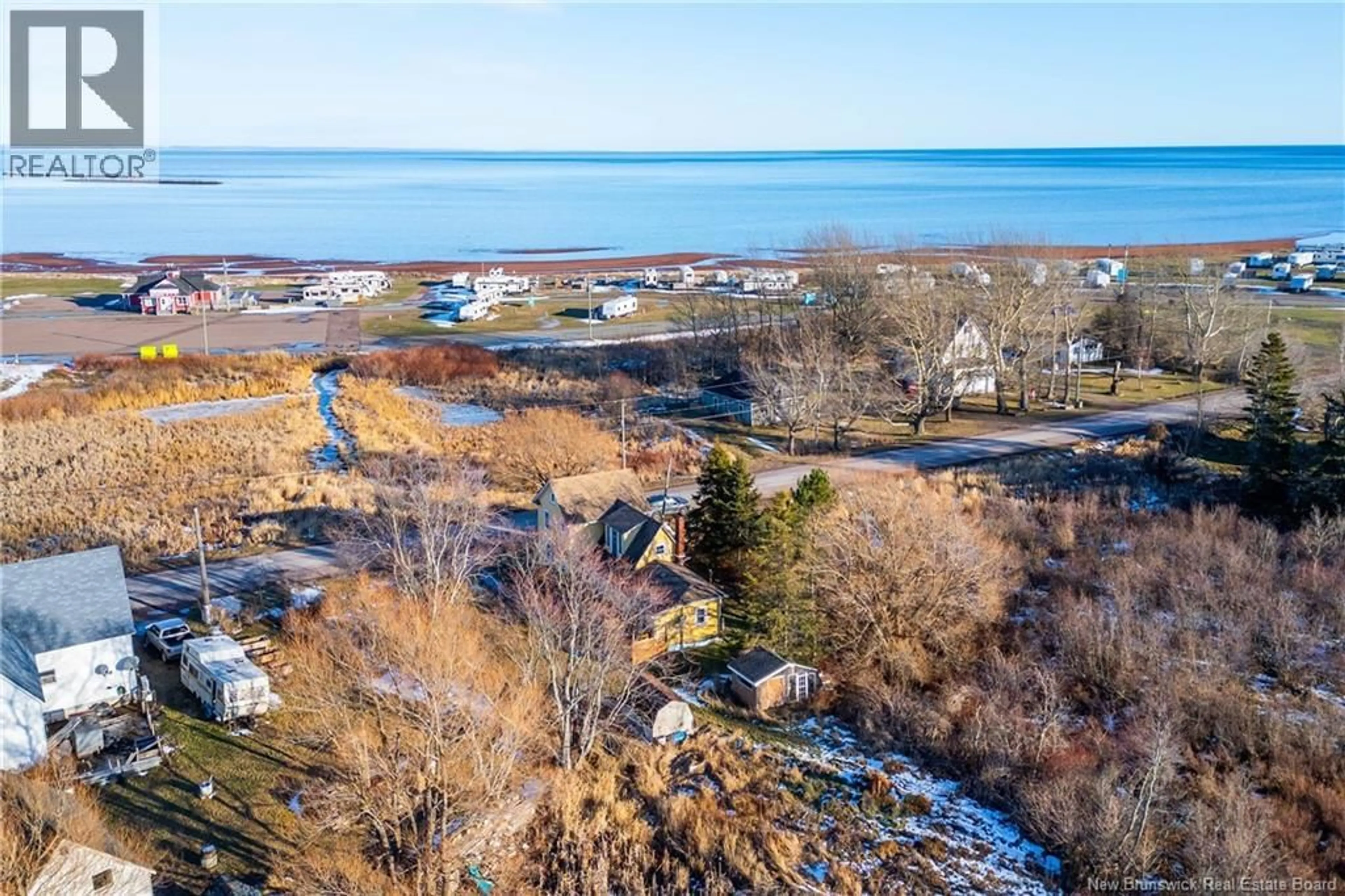 A pic from outside/outdoor area/front of a property/back of a property/a pic from drone, water/lake/river/ocean view for 18 ROUTE 955, Cape Tormentine New Brunswick E4M2A3