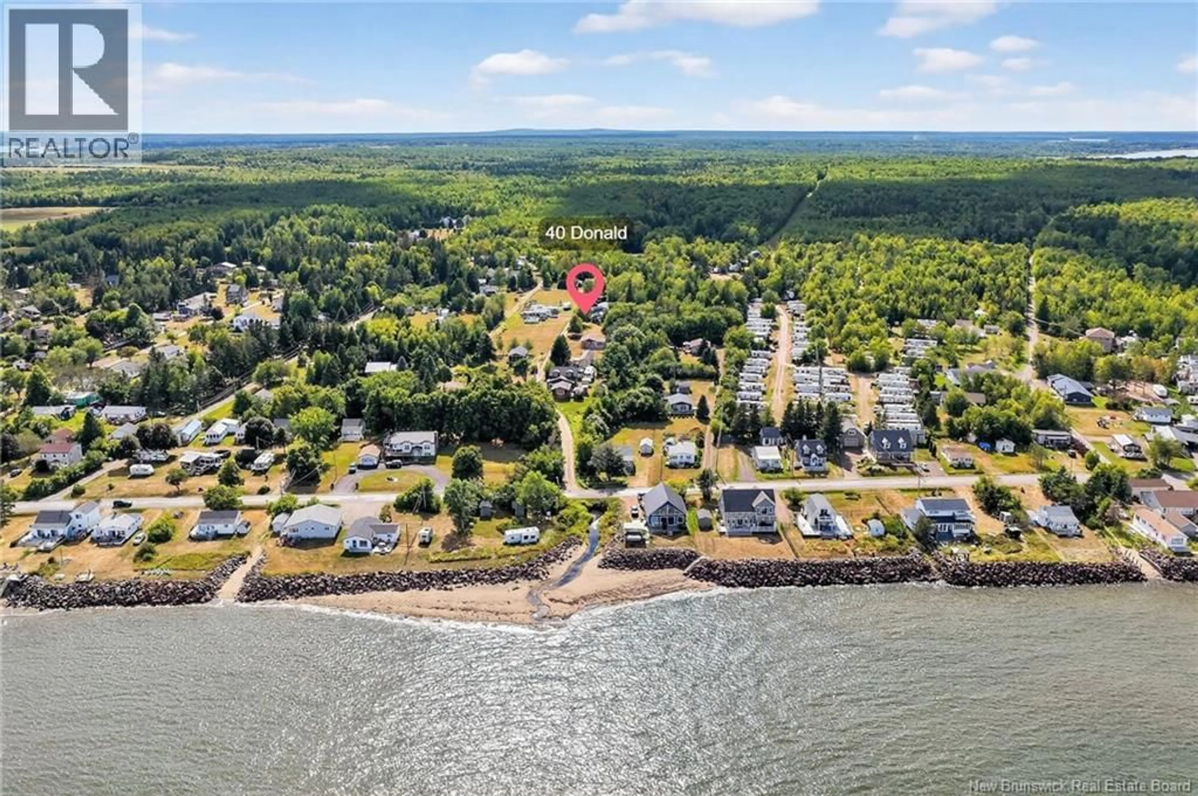 A pic from outside/outdoor area/front of a property/back of a property/a pic from drone, water/lake/river/ocean view for 40 DONALD STREET, Grande-Digue New Brunswick E4R4G5