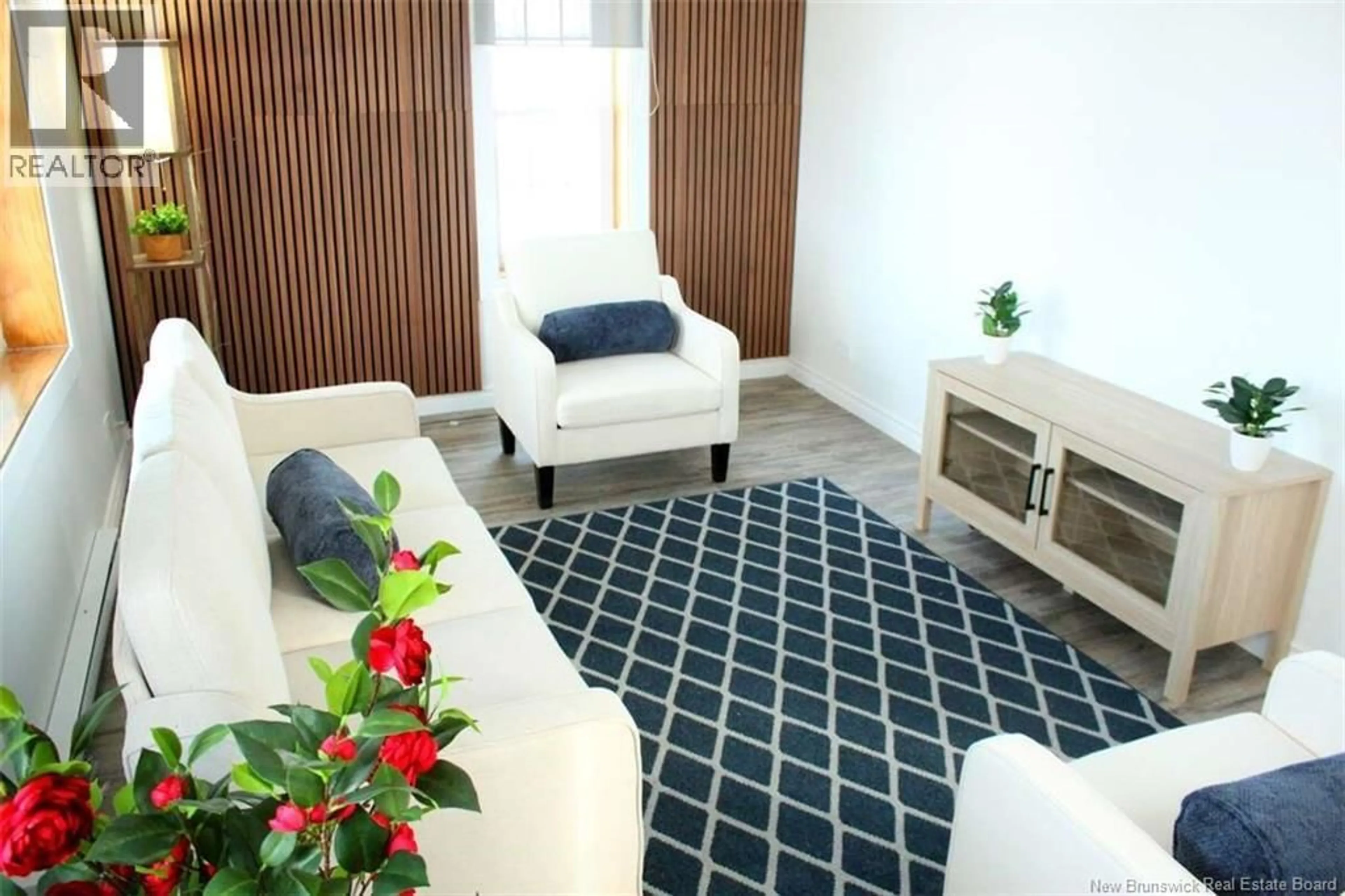 Living room with furniture, carpet floor for 5 RUE ELIZABETH, Sainte-Anne-De-Madawaska New Brunswick E7E1G8