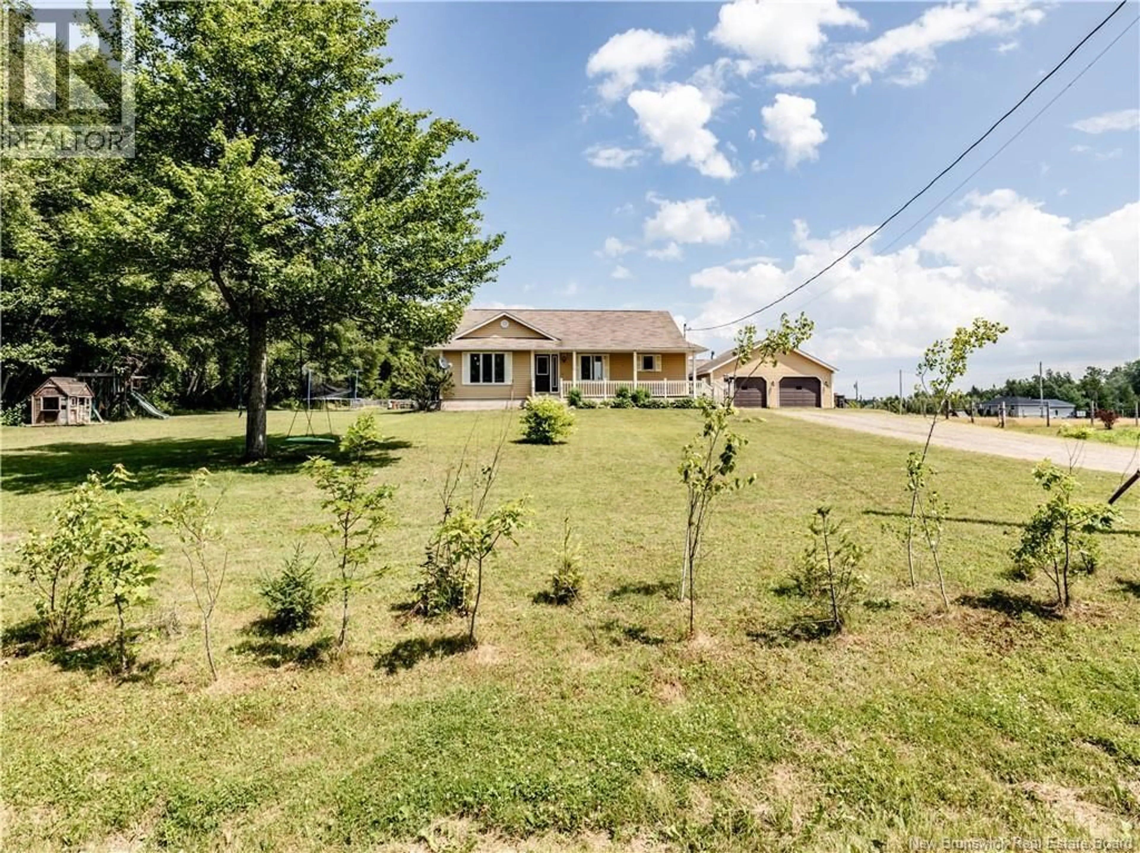 A pic from outside/outdoor area/front of a property/back of a property/a pic from drone, unknown for 18 PETITE BRANCHE RD, Acadieville New Brunswick E4Y1N2