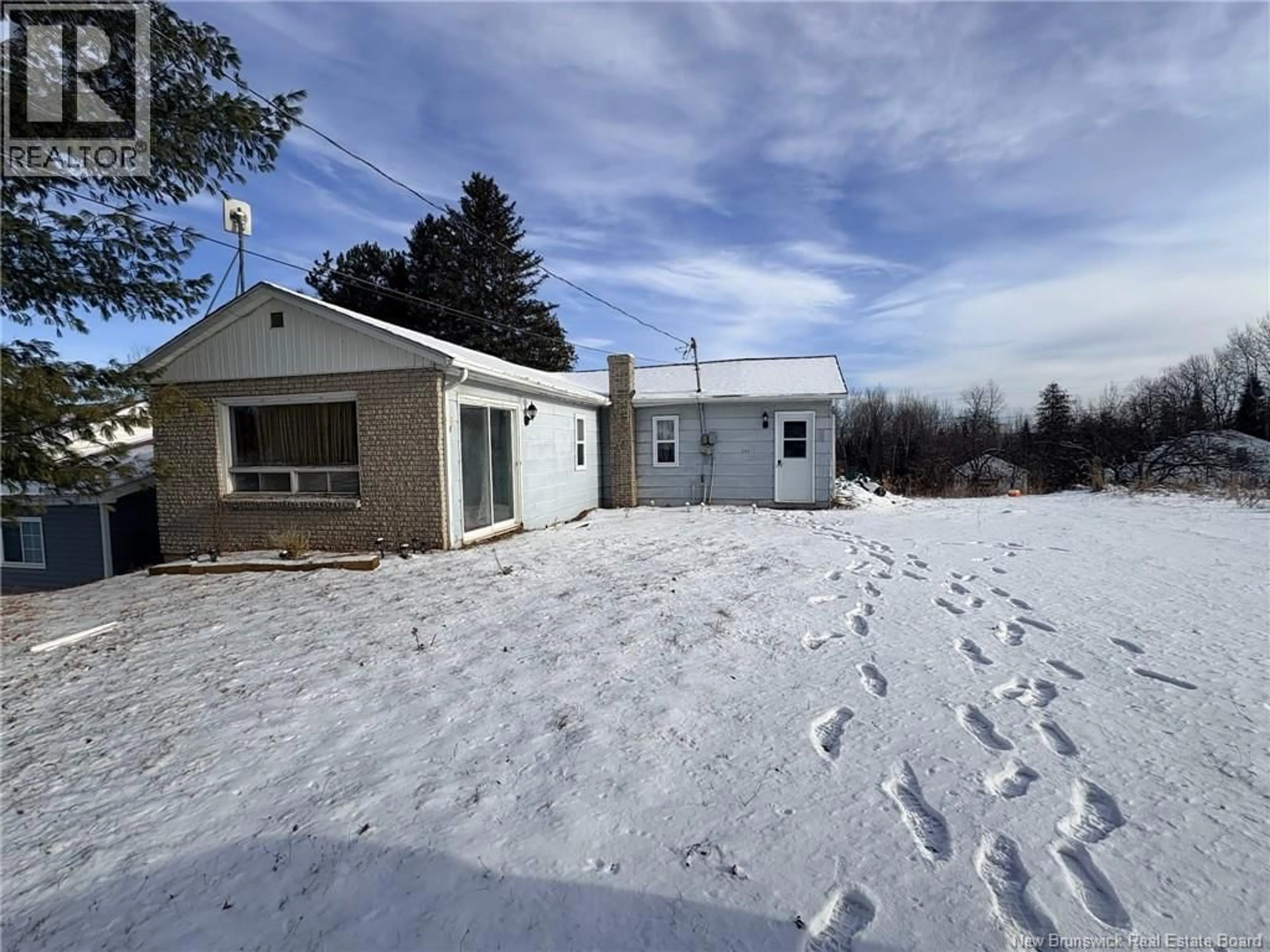 A pic from outside/outdoor area/front of a property/back of a property/a pic from drone, unknown for 140 MAIN STREET, Plaster Rock New Brunswick E7G2E4