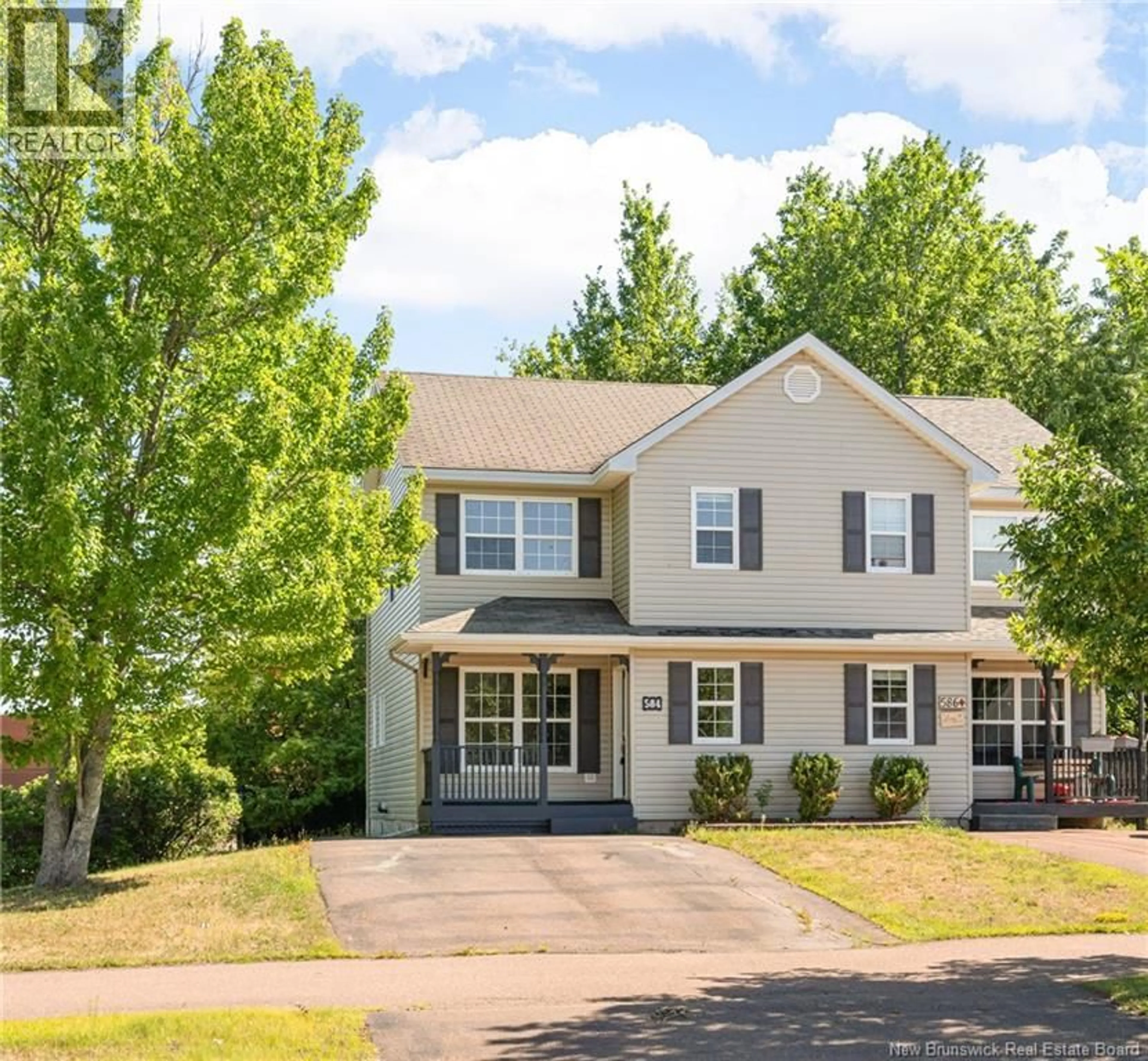 Home with vinyl exterior material, street for 584 CENTRALE STREET, Dieppe New Brunswick E1A7S3