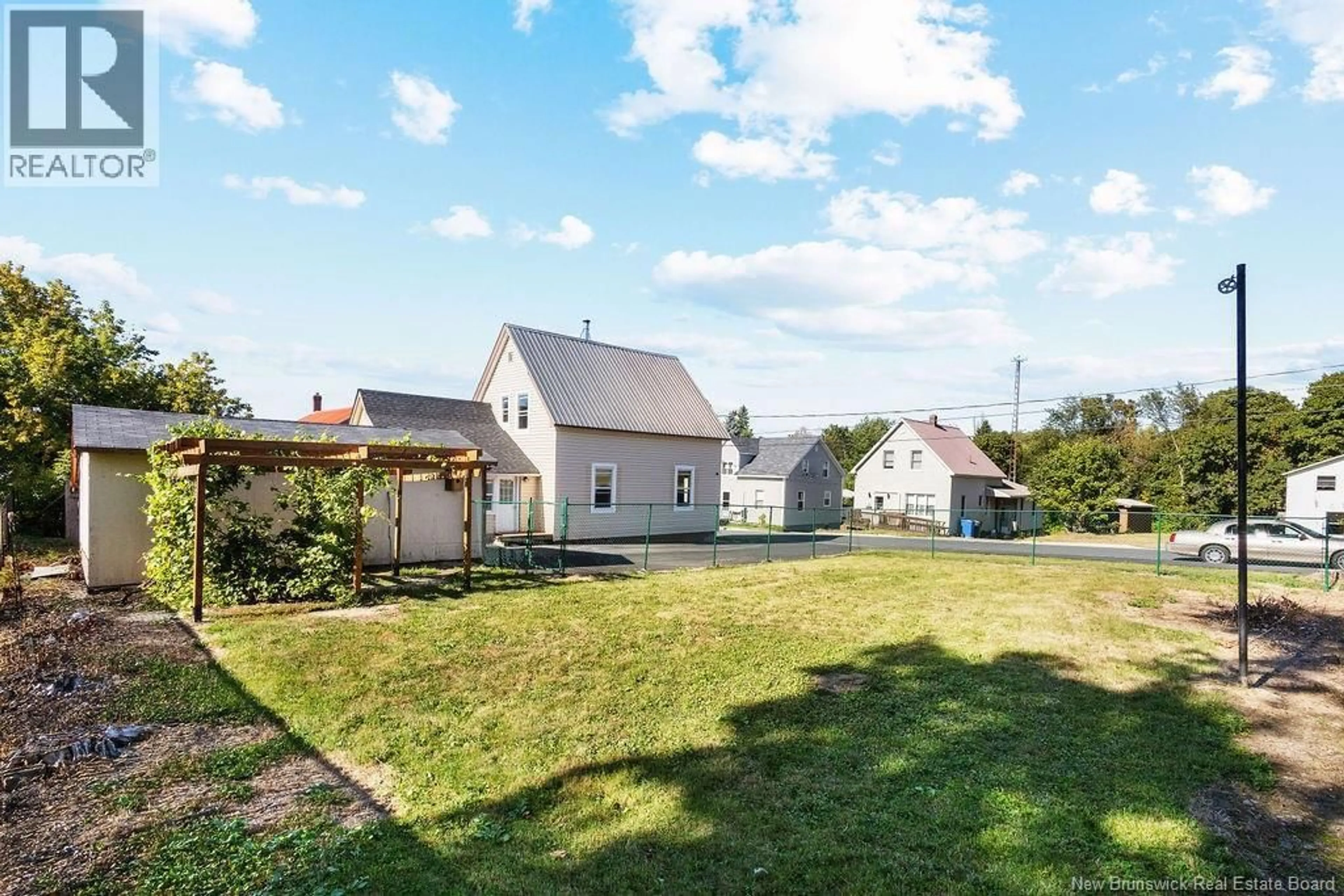 A pic from outside/outdoor area/front of a property/back of a property/a pic from drone, unknown for 72 CUNARD STREET, Miramichi New Brunswick E1N2T6