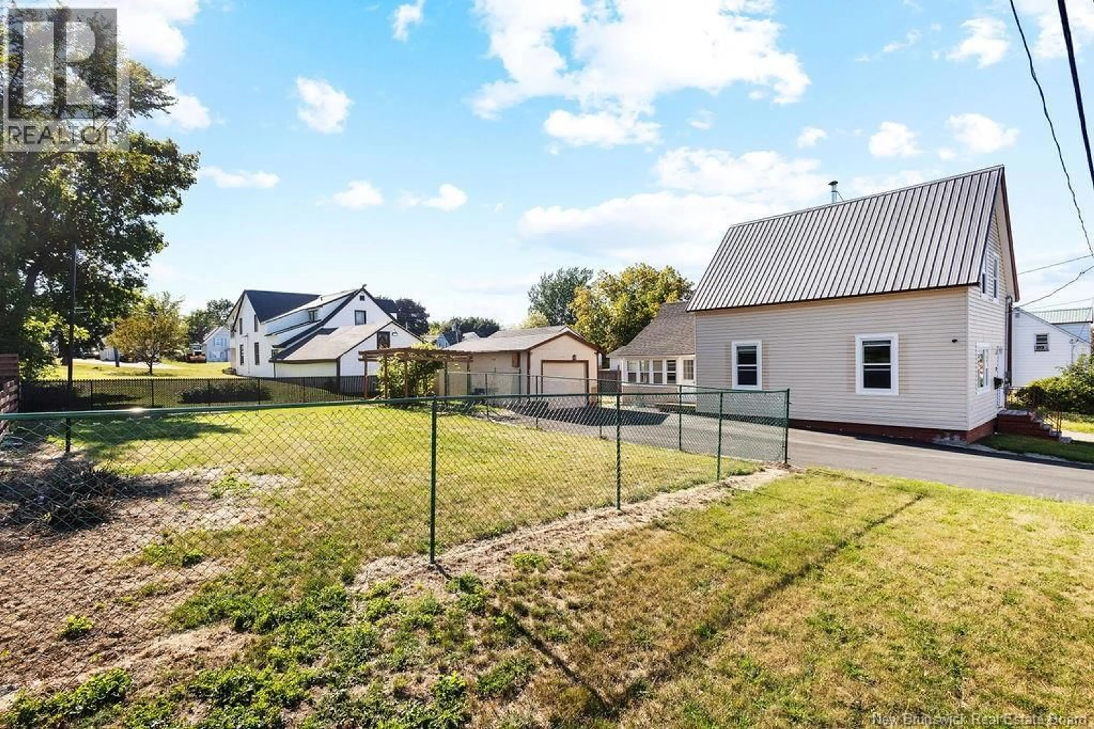 A pic from outside/outdoor area/front of a property/back of a property/a pic from drone, street for 72 CUNARD STREET, Miramichi New Brunswick E1N2T6