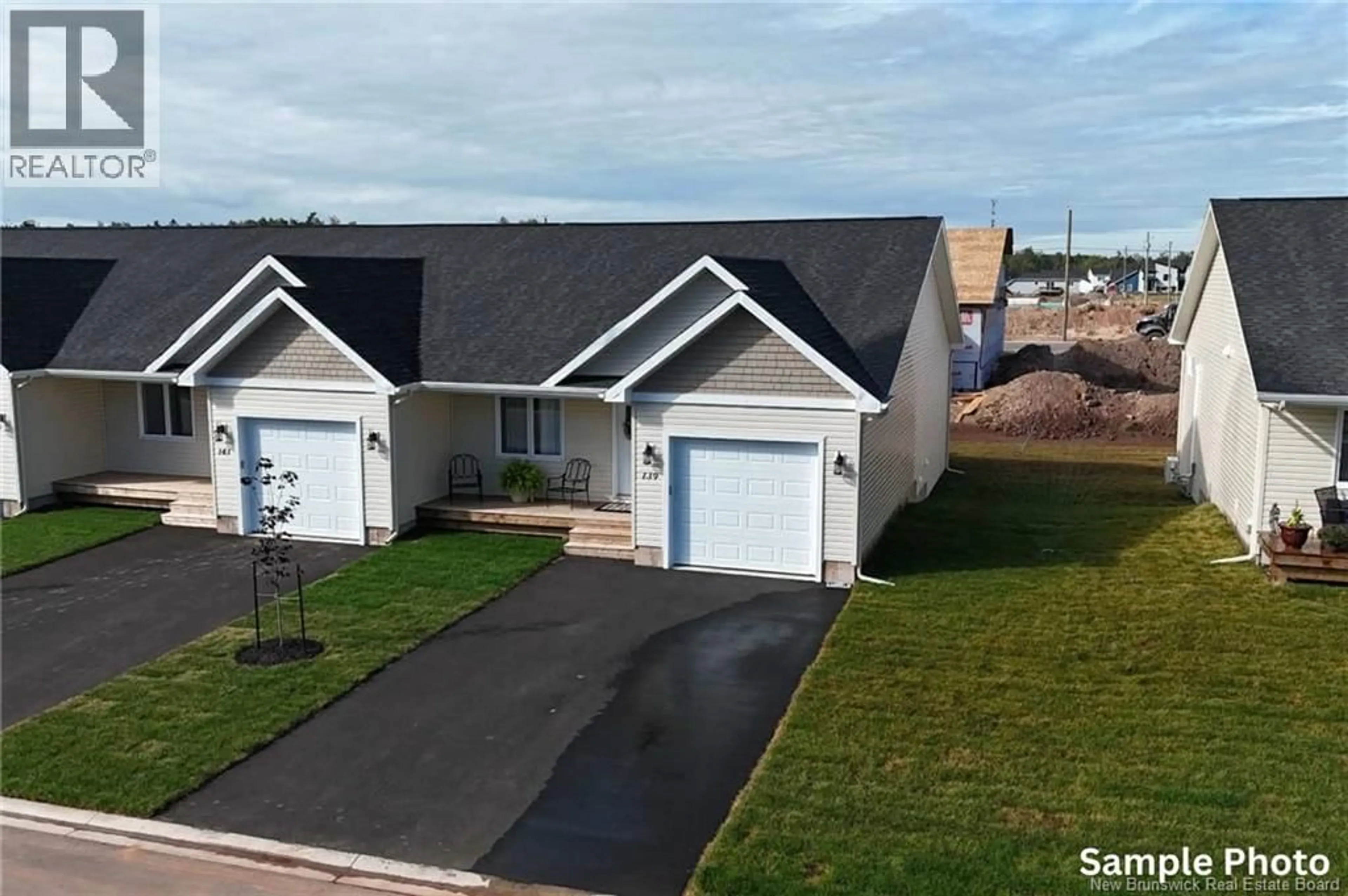 A pic from outside/outdoor area/front of a property/back of a property/a pic from drone, street for 227 SIMONE GALLANT STREET, Shediac New Brunswick E4P2B7