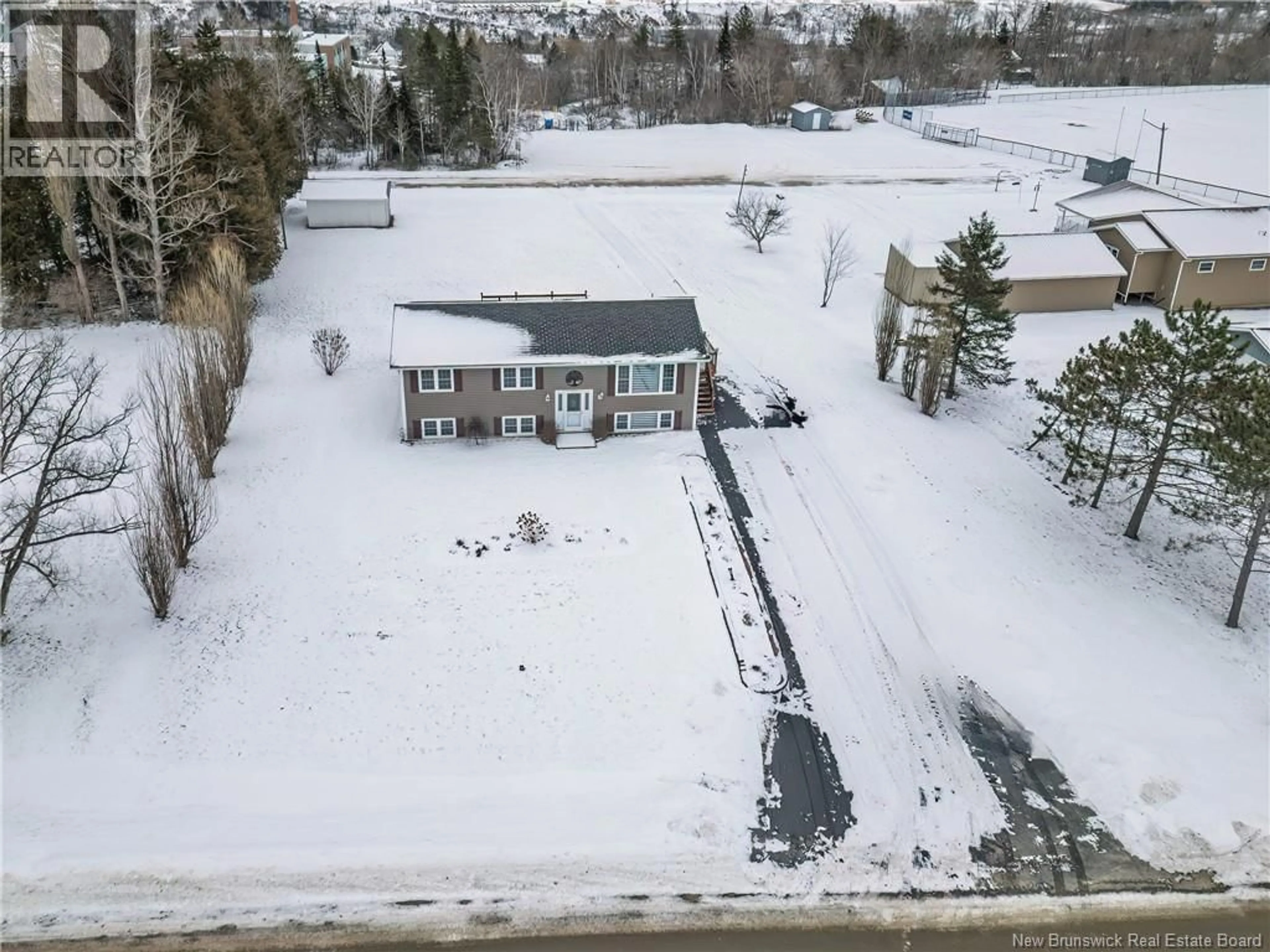 A pic from outside/outdoor area/front of a property/back of a property/a pic from drone, street for 56 CENTENNIAL, Plaster Rock New Brunswick E7G1H5