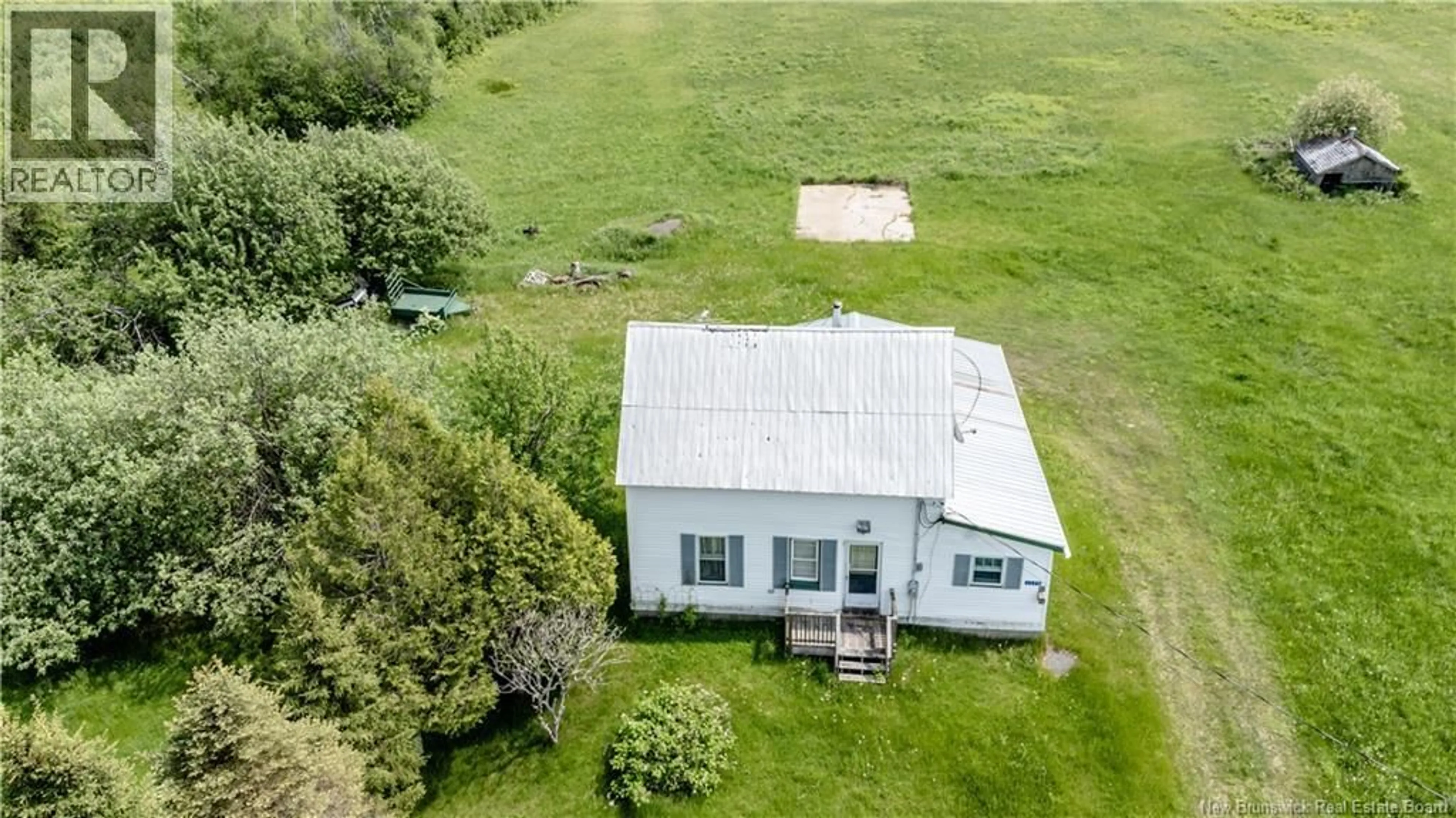 A pic from outside/outdoor area/front of a property/back of a property/a pic from drone, building for 1175 SAINT-SOSIME ROAD, Adamsville New Brunswick E4T3V9