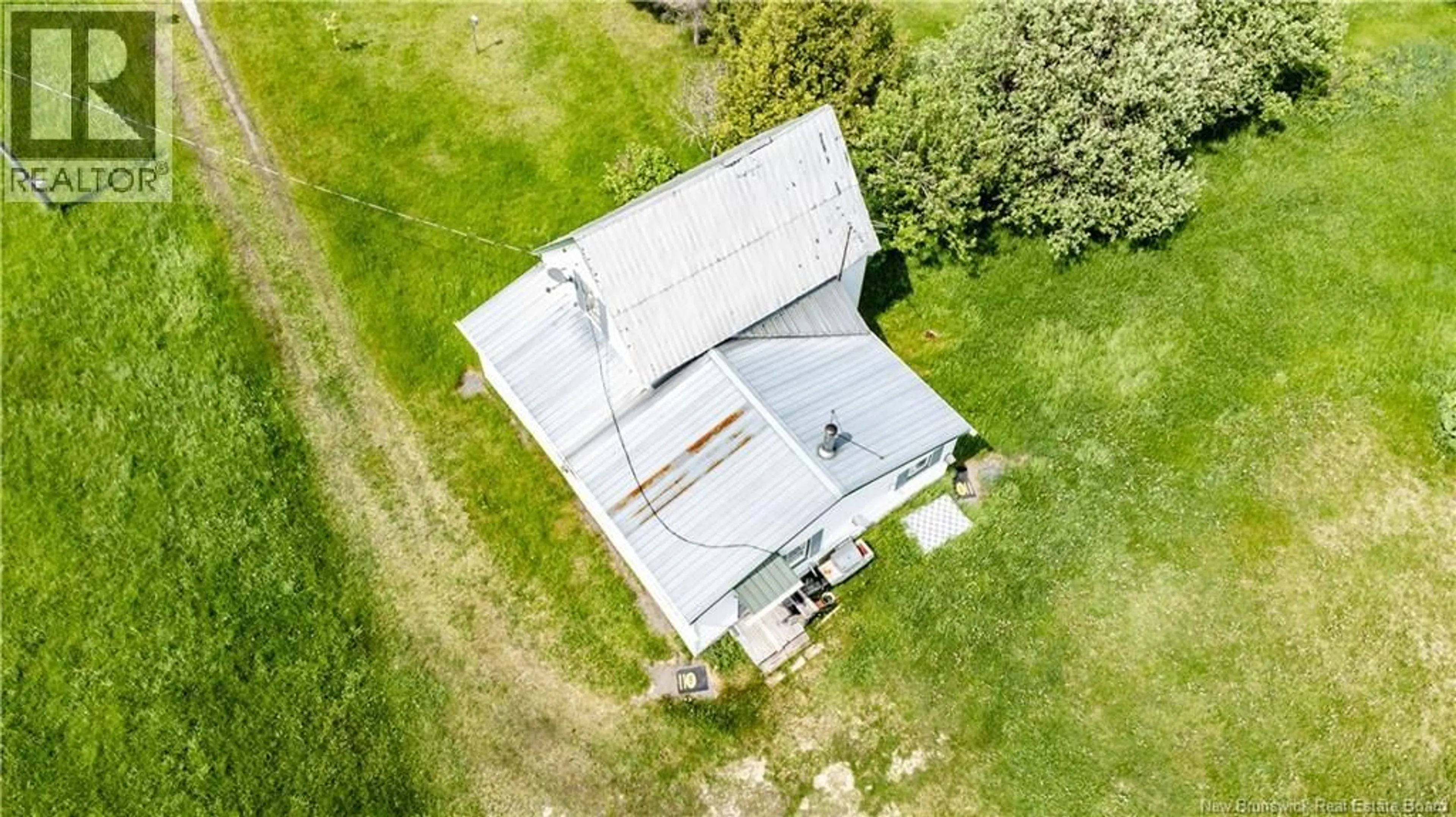 A pic from outside/outdoor area/front of a property/back of a property/a pic from drone, building for 1175 SAINT-SOSIME ROAD, Adamsville New Brunswick E4T3V9