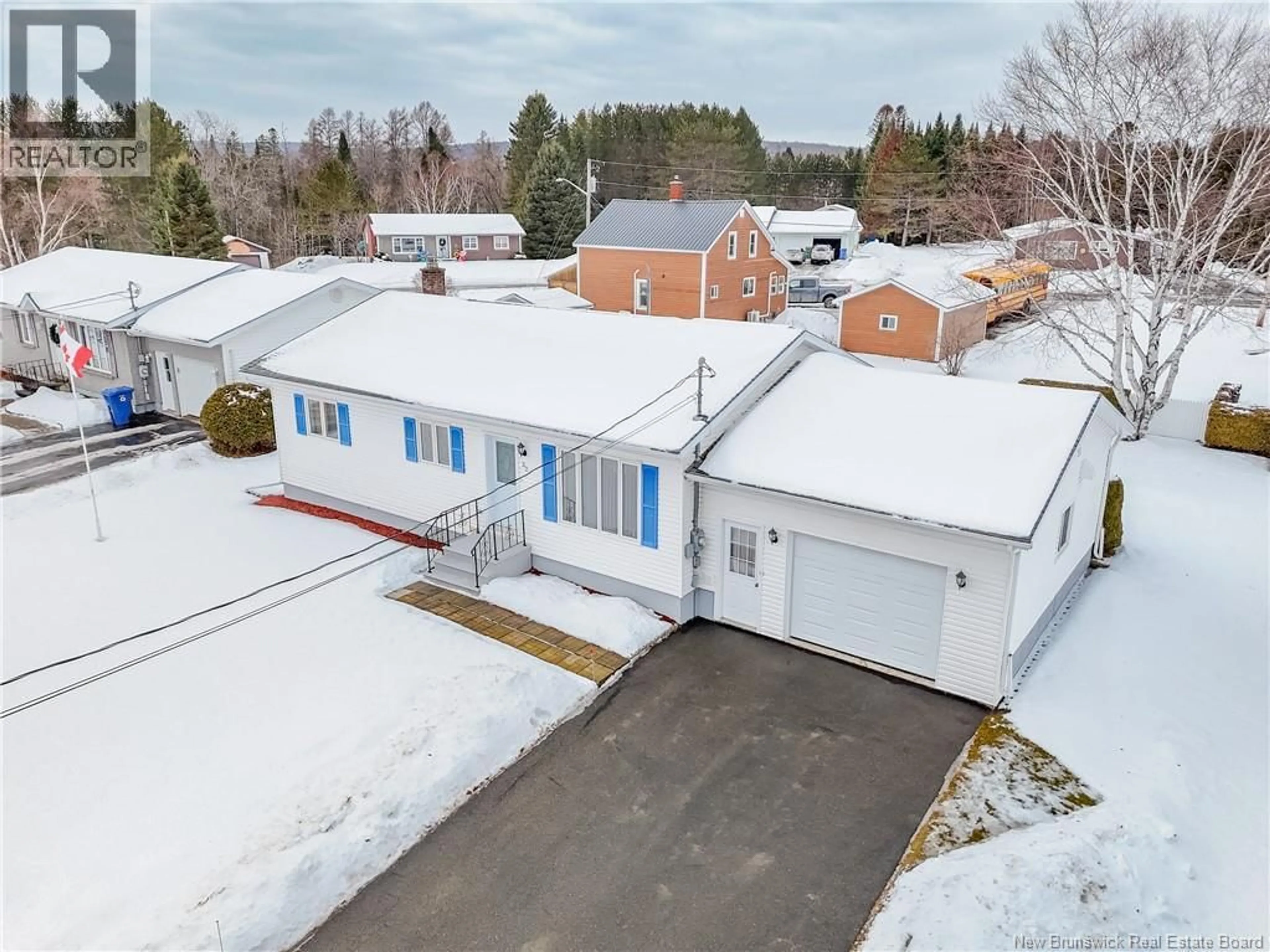 A pic from outside/outdoor area/front of a property/back of a property/a pic from drone, street for 32 HILLCREST DRIVE, Perth-Andover New Brunswick E7H2H1