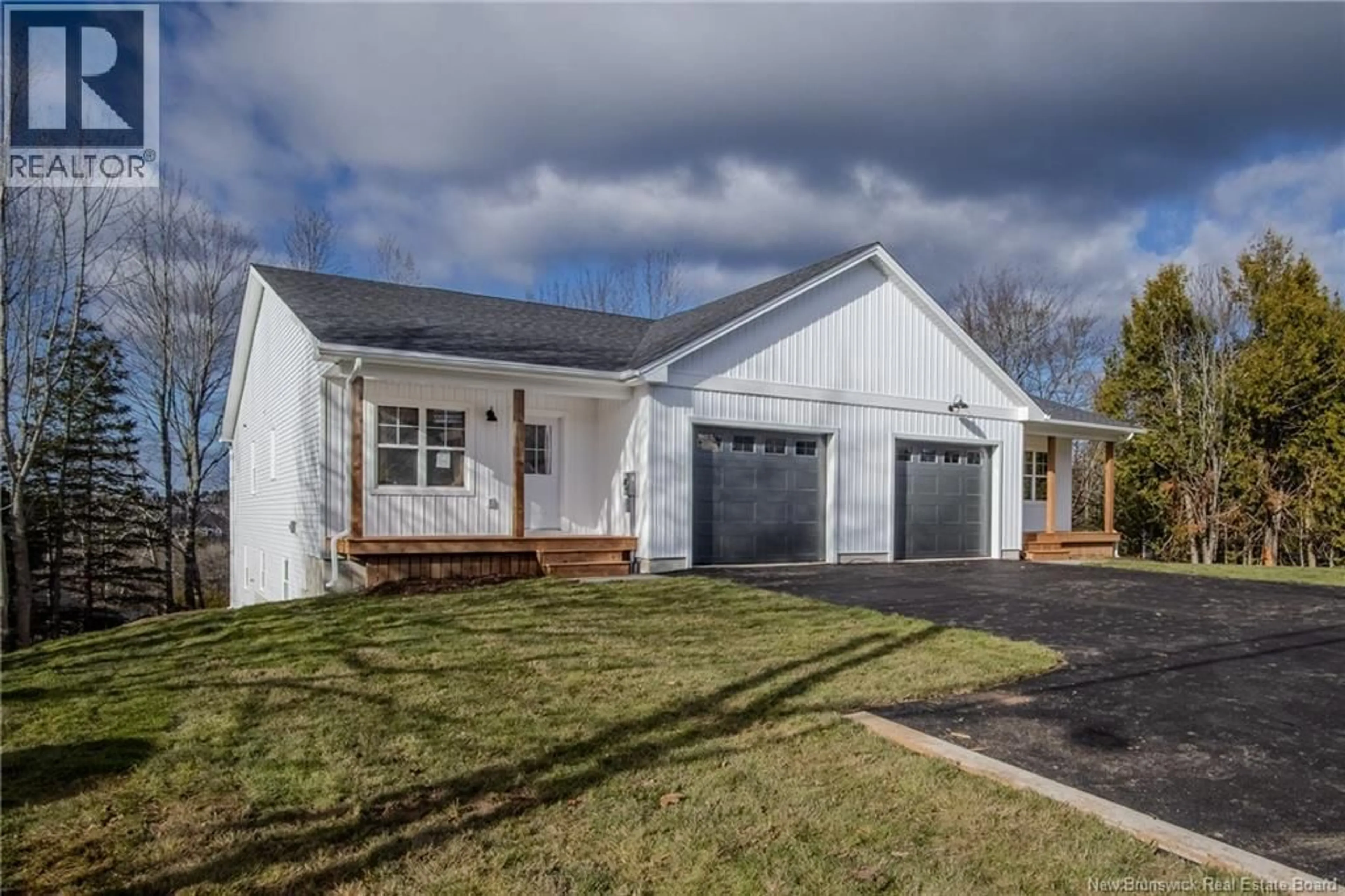 Home with vinyl exterior material, street for 329 HAMPTON ROAD, Quispamsis New Brunswick E2E4T1