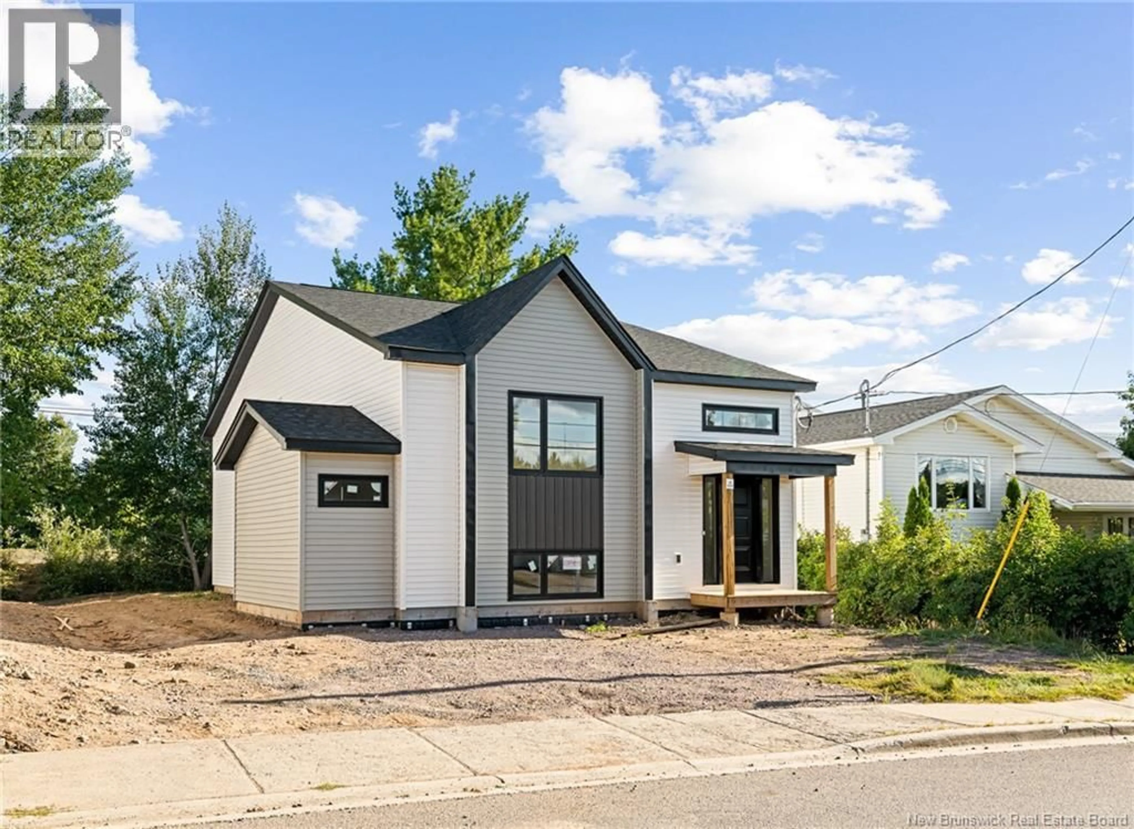 Home with vinyl exterior material, street for 220 GOULD STREET, Dieppe New Brunswick E1A1V1