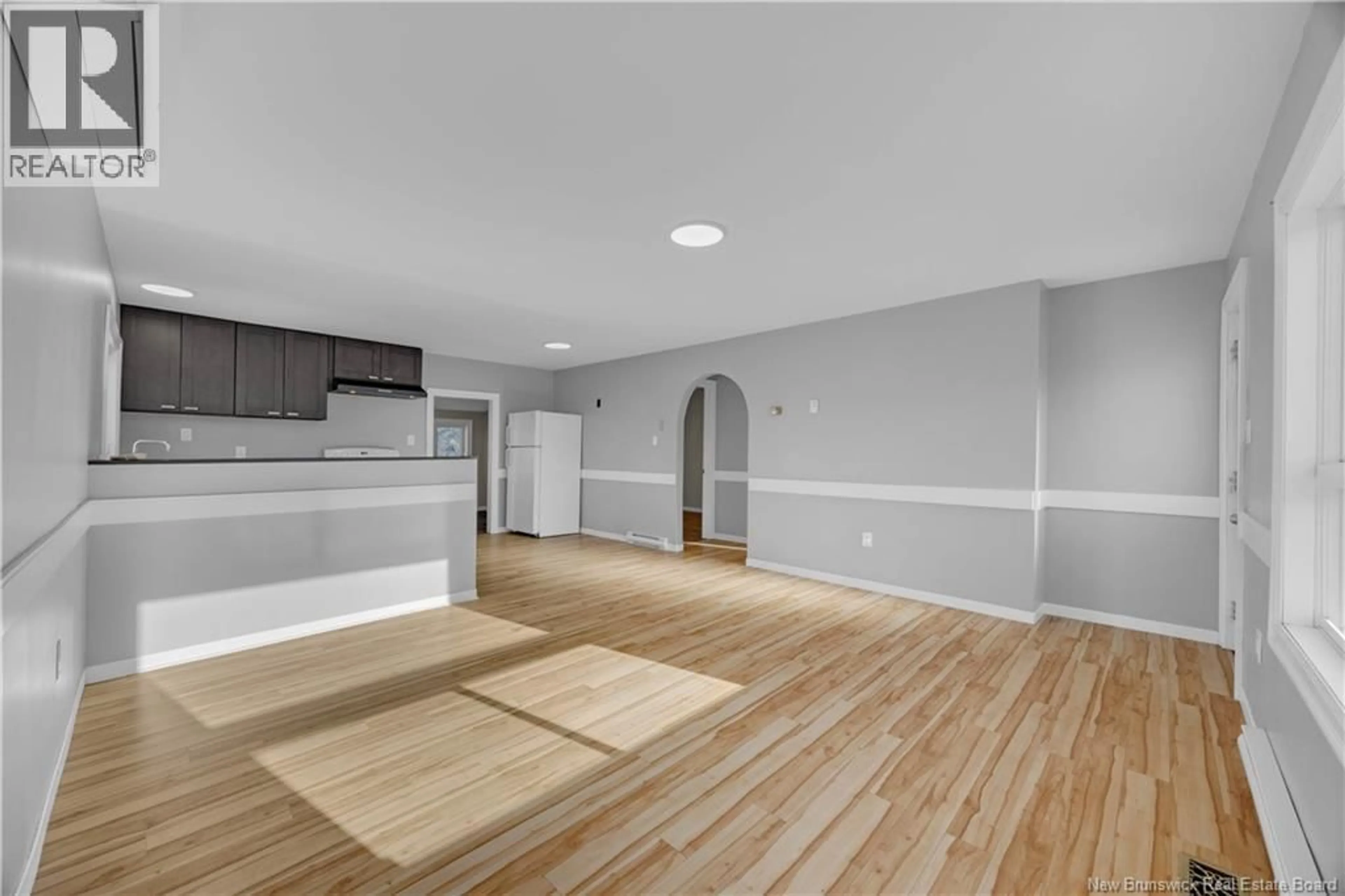 Open concept kitchen, wood/laminate floor for 1807 HICKEY ROAD, Saint John New Brunswick E2J4E4