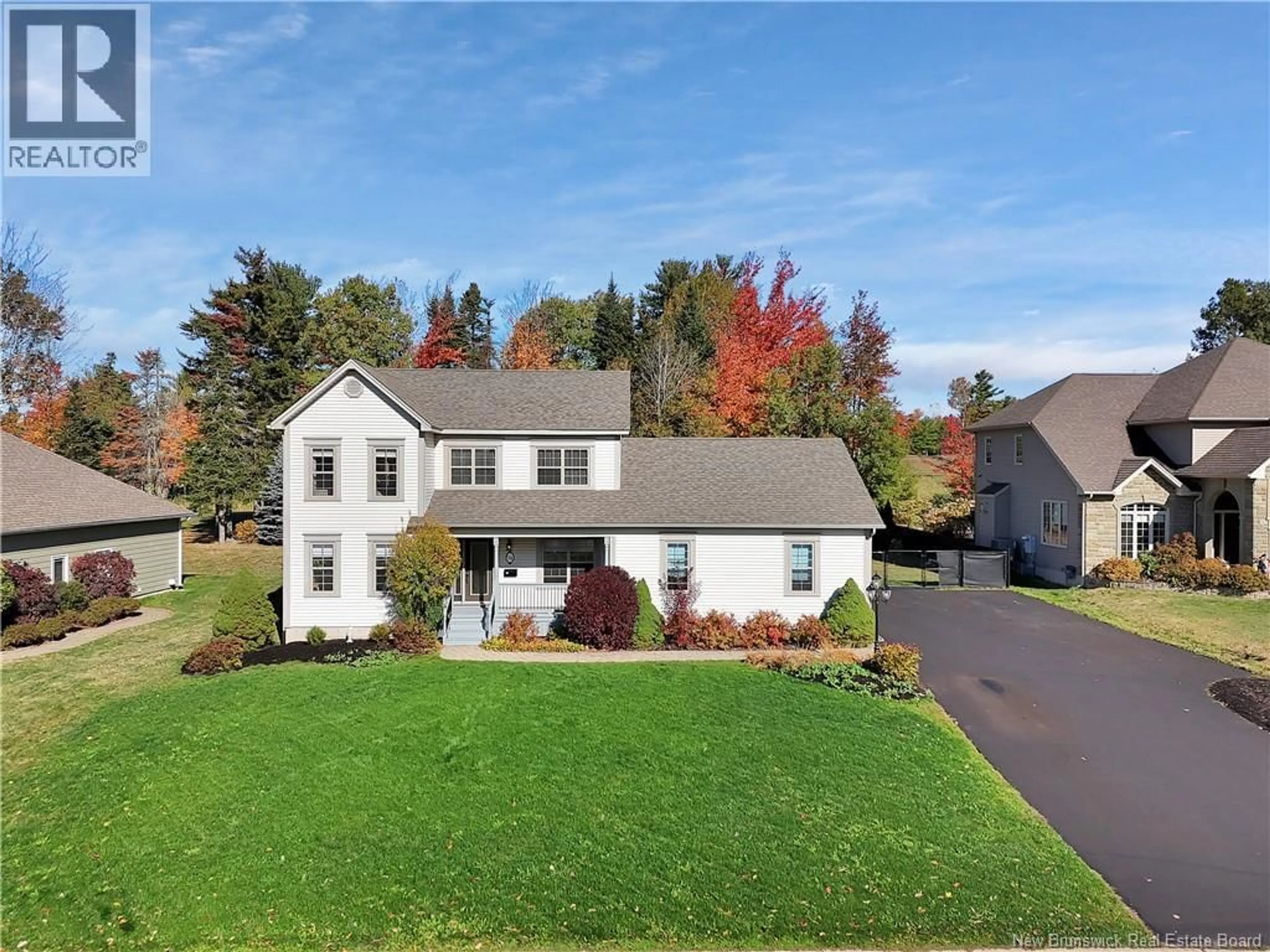 Home with vinyl exterior material, street for 94 DU GOLF, Dieppe New Brunswick E1A8J6