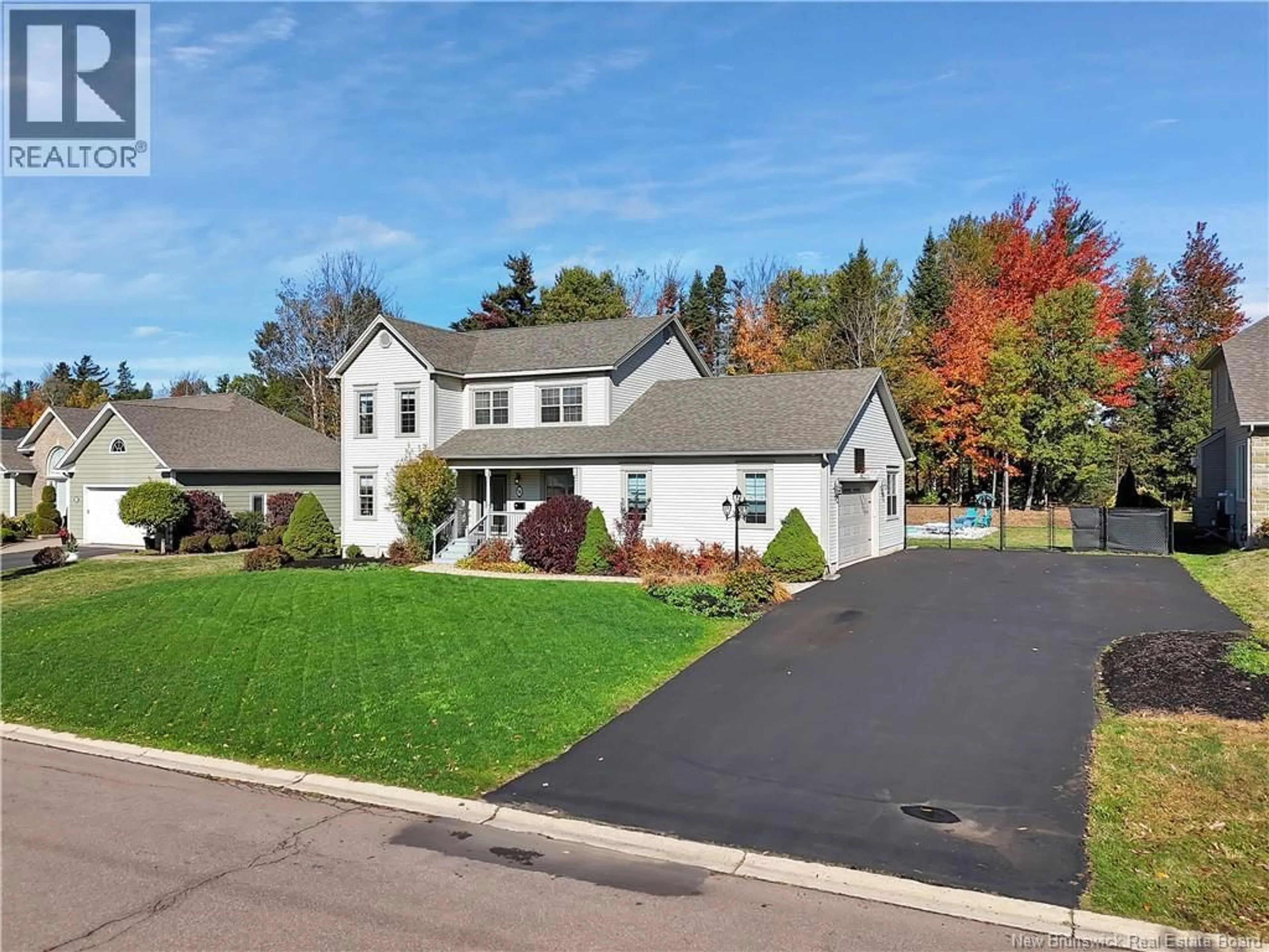 Home with vinyl exterior material, street for 94 DU GOLF, Dieppe New Brunswick E1A8J6