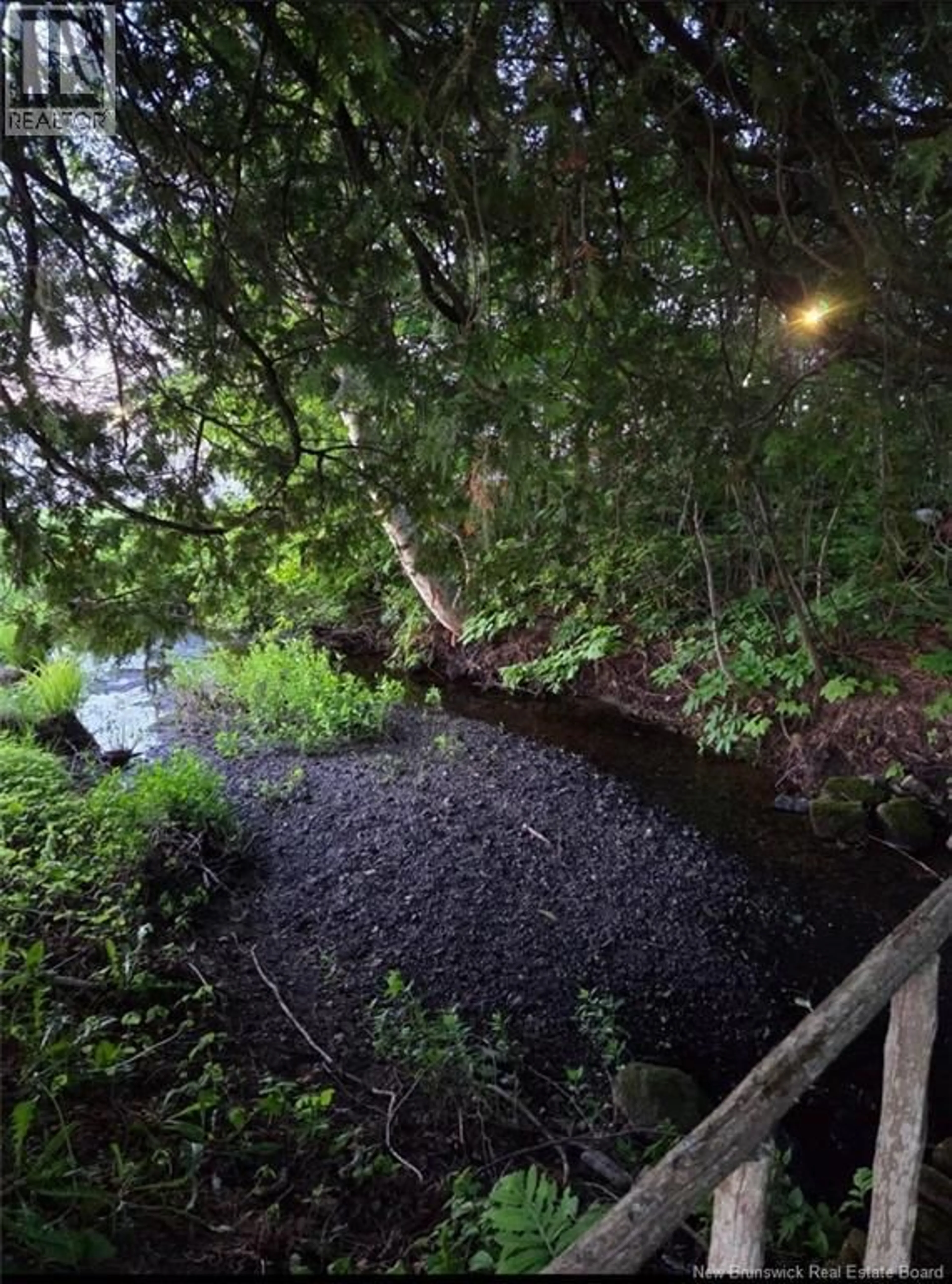 A pic from outside/outdoor area/front of a property/back of a property/a pic from drone, water/lake/river/ocean view for 648 PRINCIPALE, Beresford New Brunswick E8K2B5