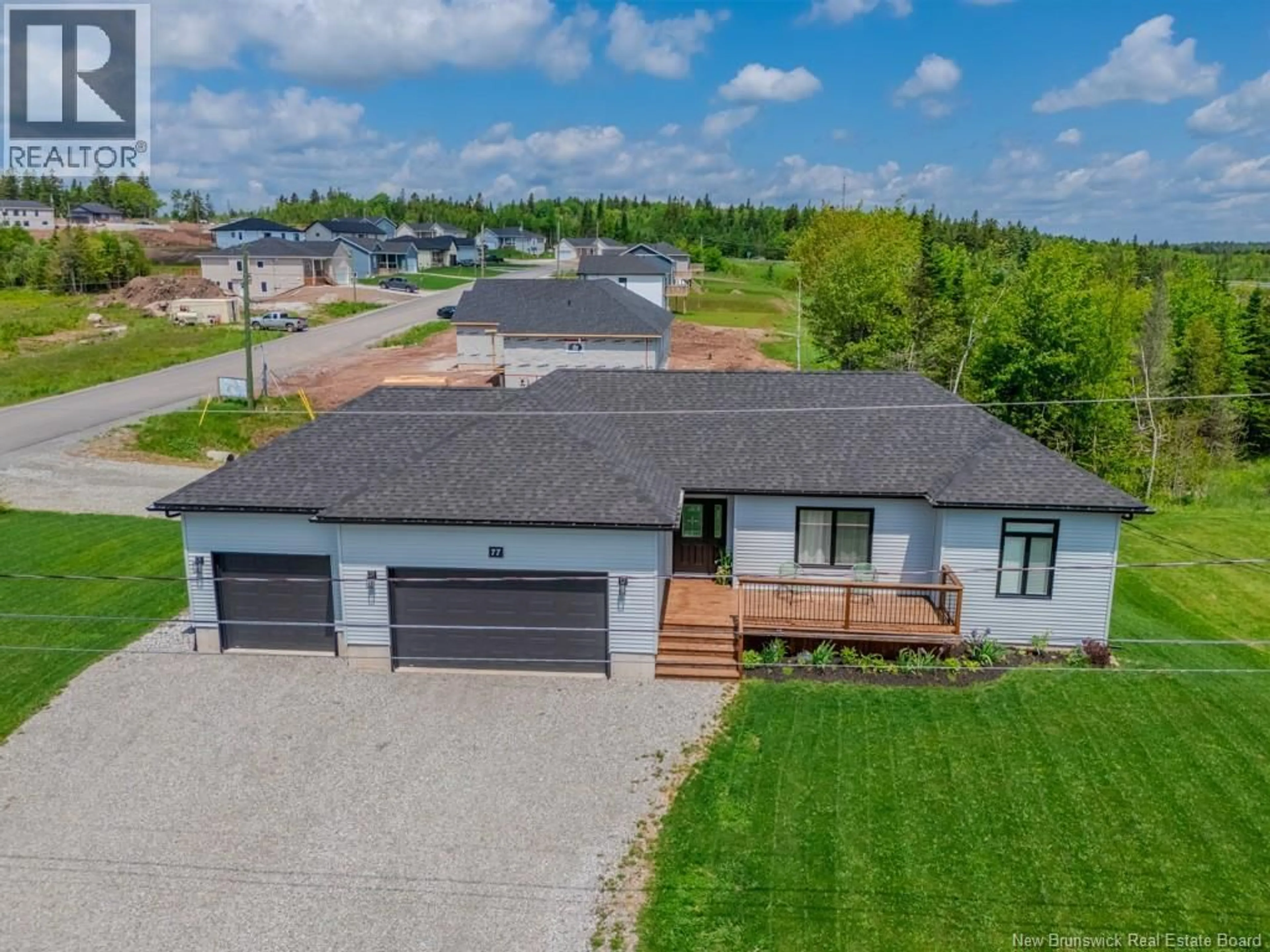 A pic from outside/outdoor area/front of a property/back of a property/a pic from drone, street for 77 MEADOWLARK DRIVE, Quispamsis New Brunswick E2E0T6