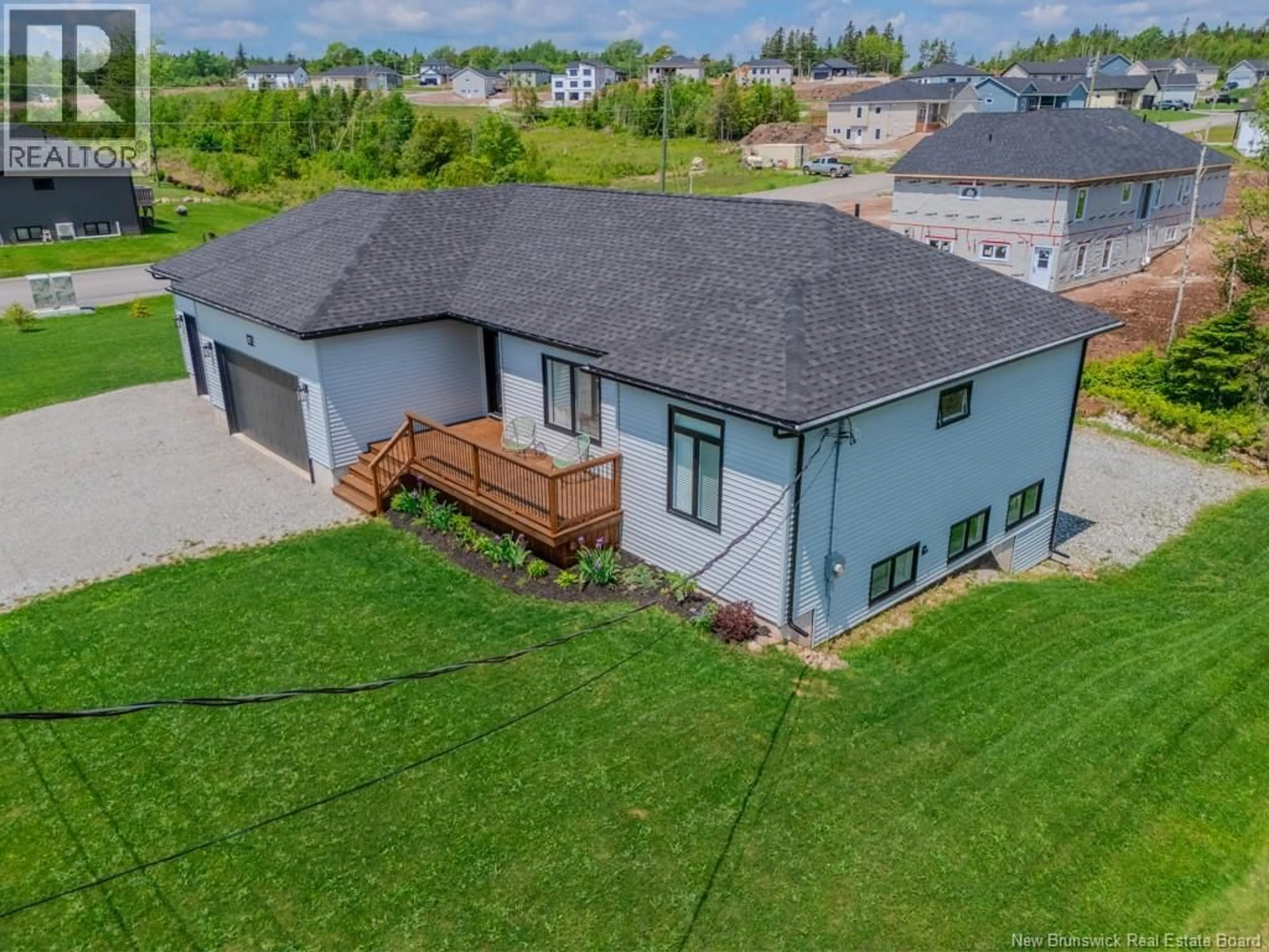 A pic from outside/outdoor area/front of a property/back of a property/a pic from drone, unknown for 77 MEADOWLARK DRIVE, Quispamsis New Brunswick E2E0T6