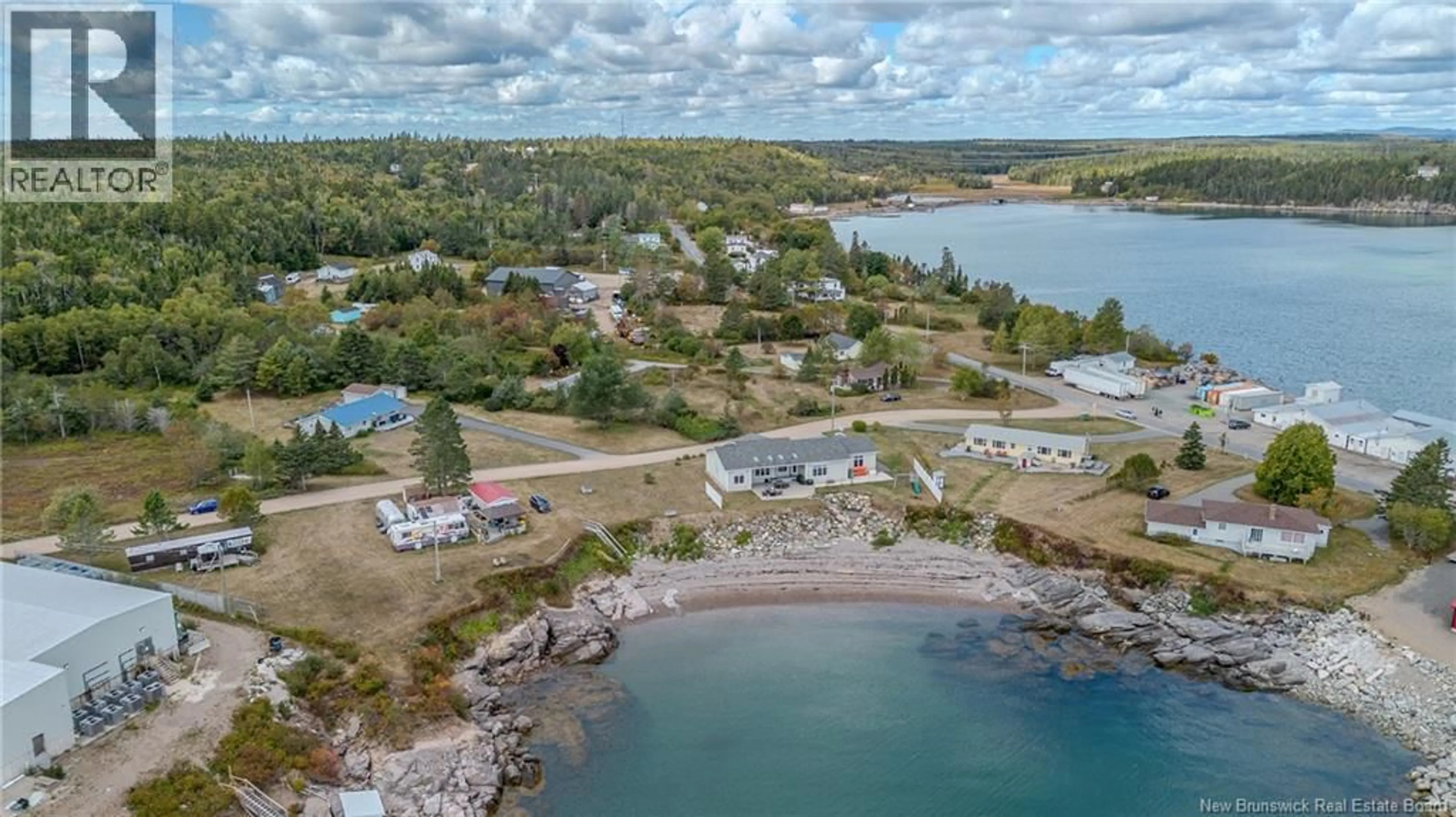 A pic from outside/outdoor area/front of a property/back of a property/a pic from drone, water/lake/river/ocean view for 12 LONG BEACH LANE, Dipper Harbour New Brunswick E5J1X6