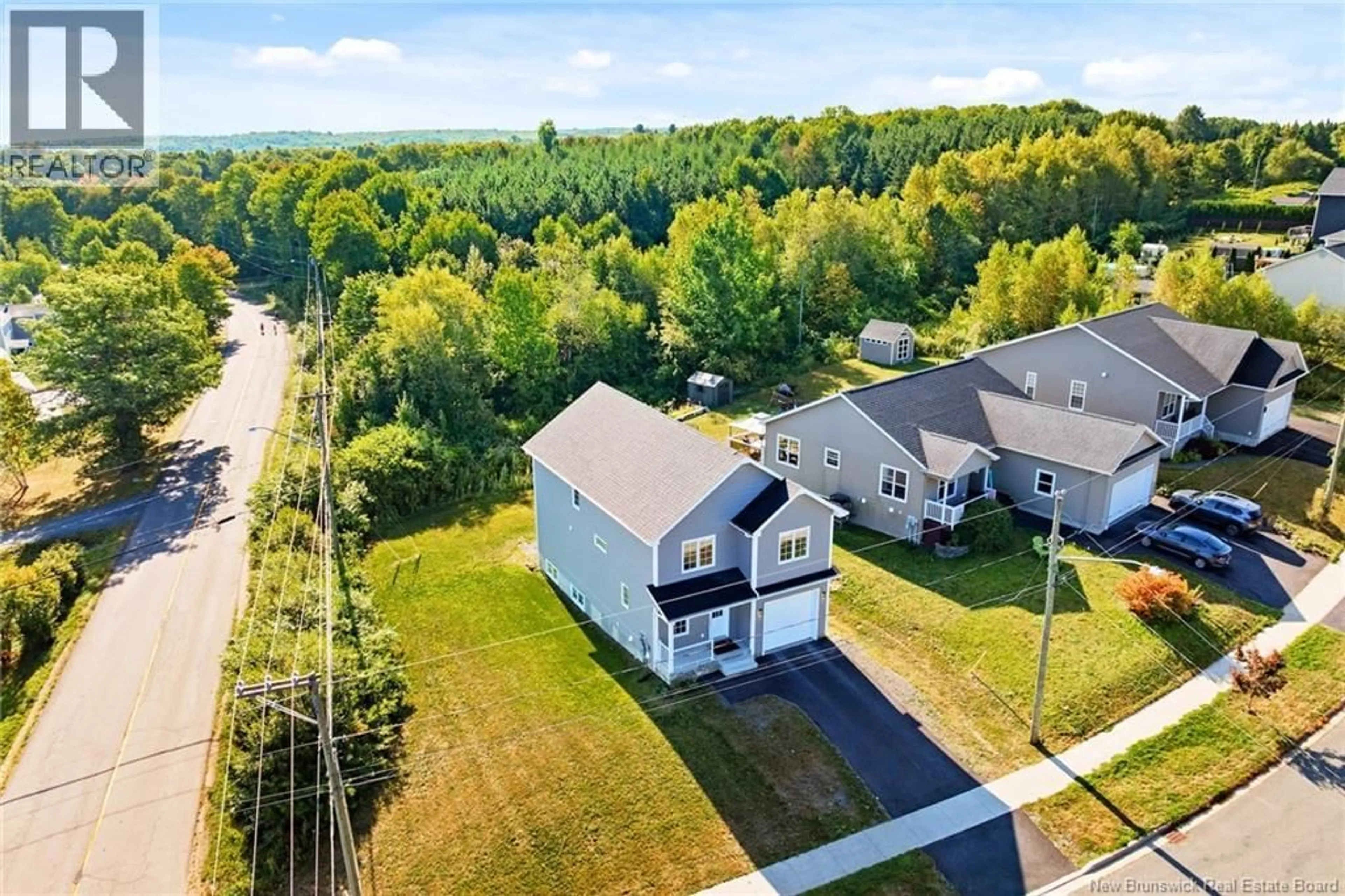 A pic from outside/outdoor area/front of a property/back of a property/a pic from drone, water/lake/river/ocean view for 5 STAPLETON STREET, Fredericton New Brunswick E3C0J5