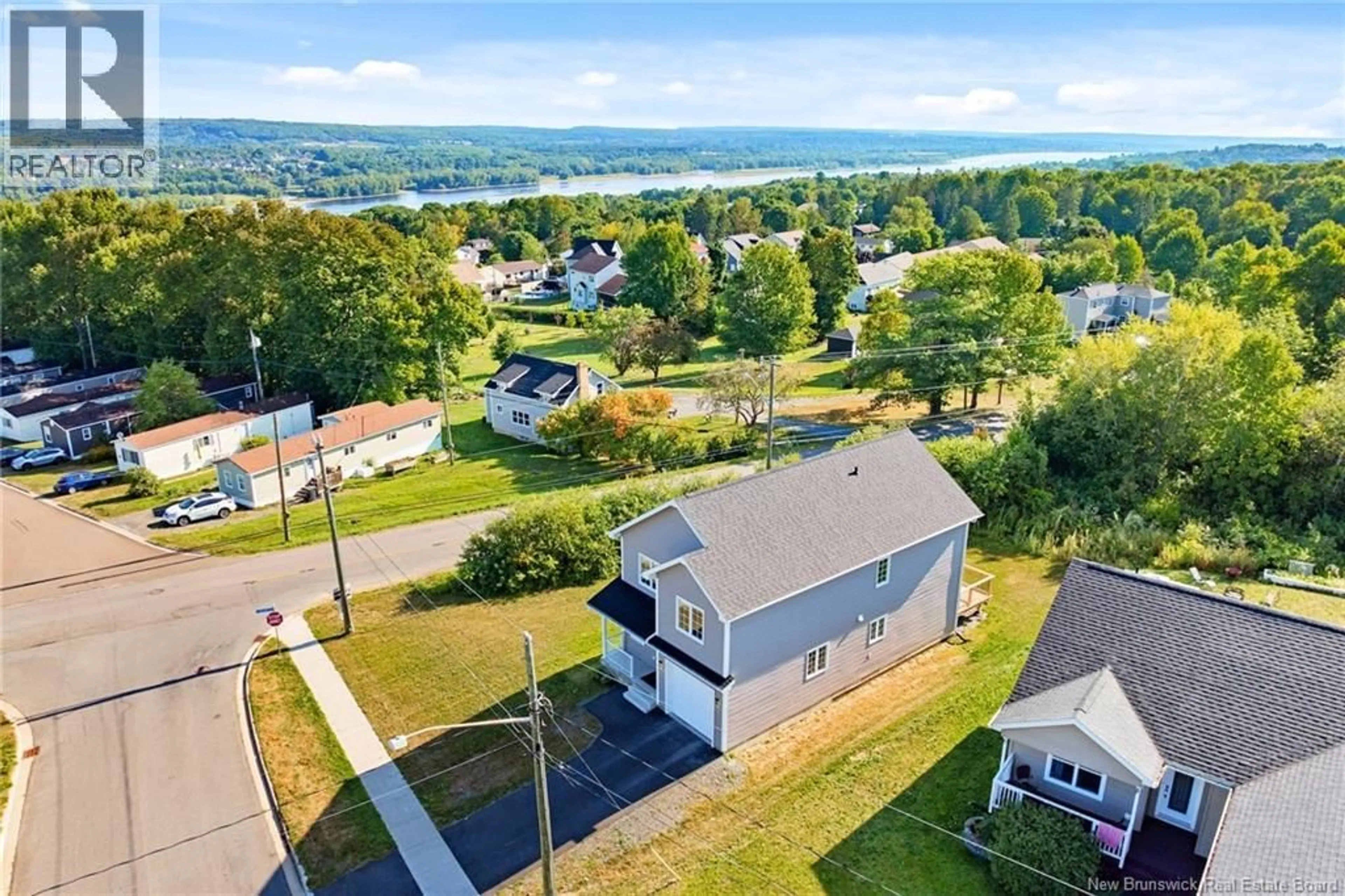 A pic from outside/outdoor area/front of a property/back of a property/a pic from drone, water/lake/river/ocean view for 5 STAPLETON STREET, Fredericton New Brunswick E3C0J5