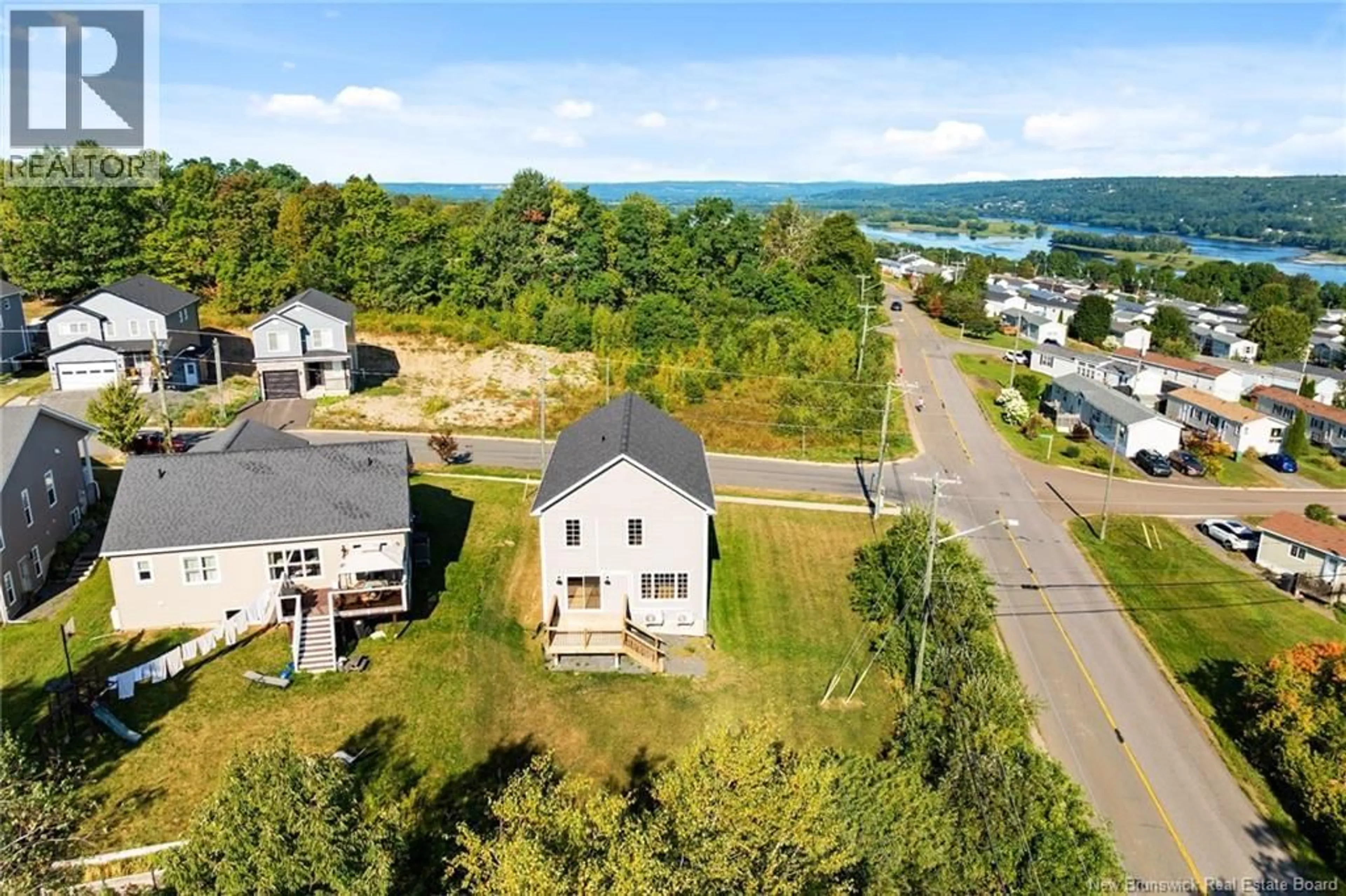 A pic from outside/outdoor area/front of a property/back of a property/a pic from drone, water/lake/river/ocean view for 5 STAPLETON STREET, Fredericton New Brunswick E3C0J5
