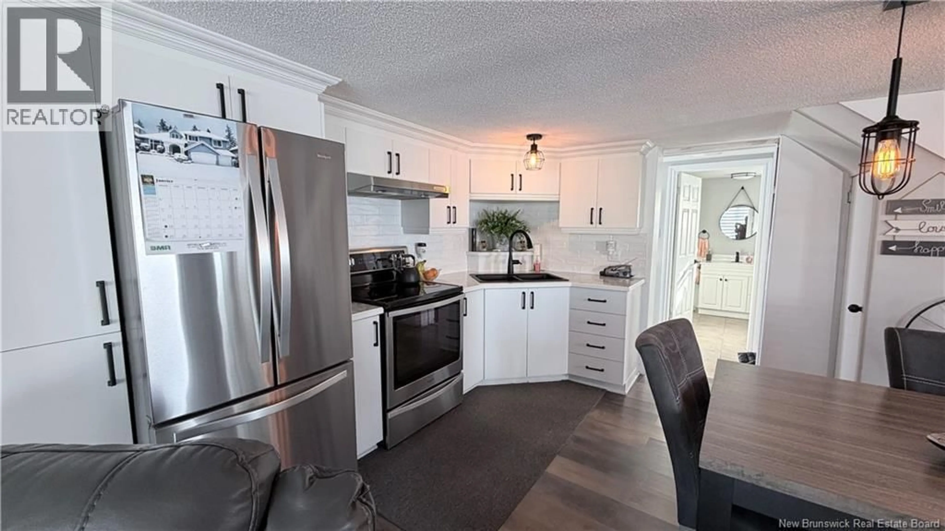 Open concept kitchen, unknown for 15 RINGUETTE ROAD, Sainte-Anne-De-Madawaska New Brunswick E7E1E6