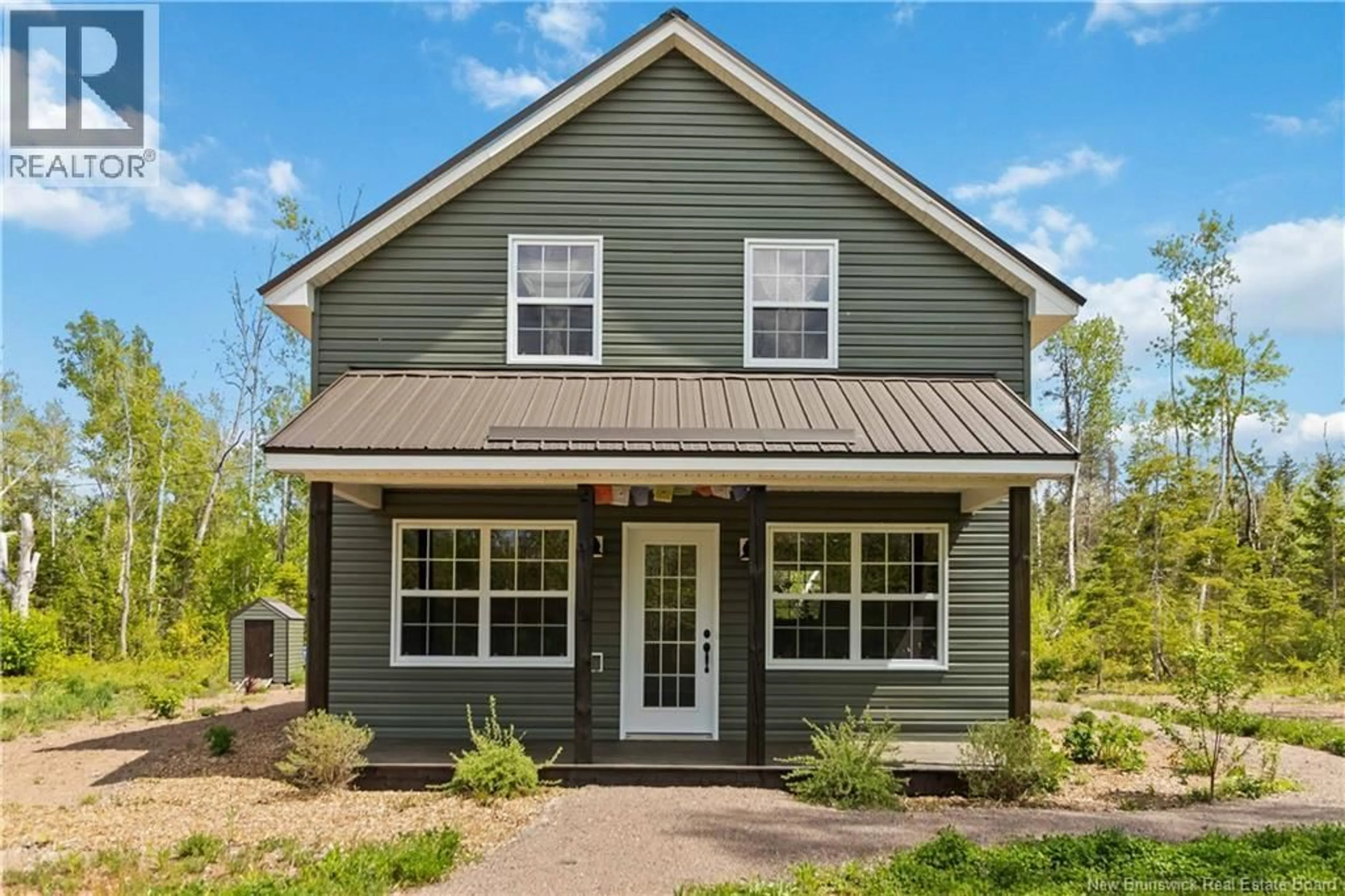 Home with vinyl exterior material, street for 33 BARON ROAD, Grand-Barachois New Brunswick E4P9A6