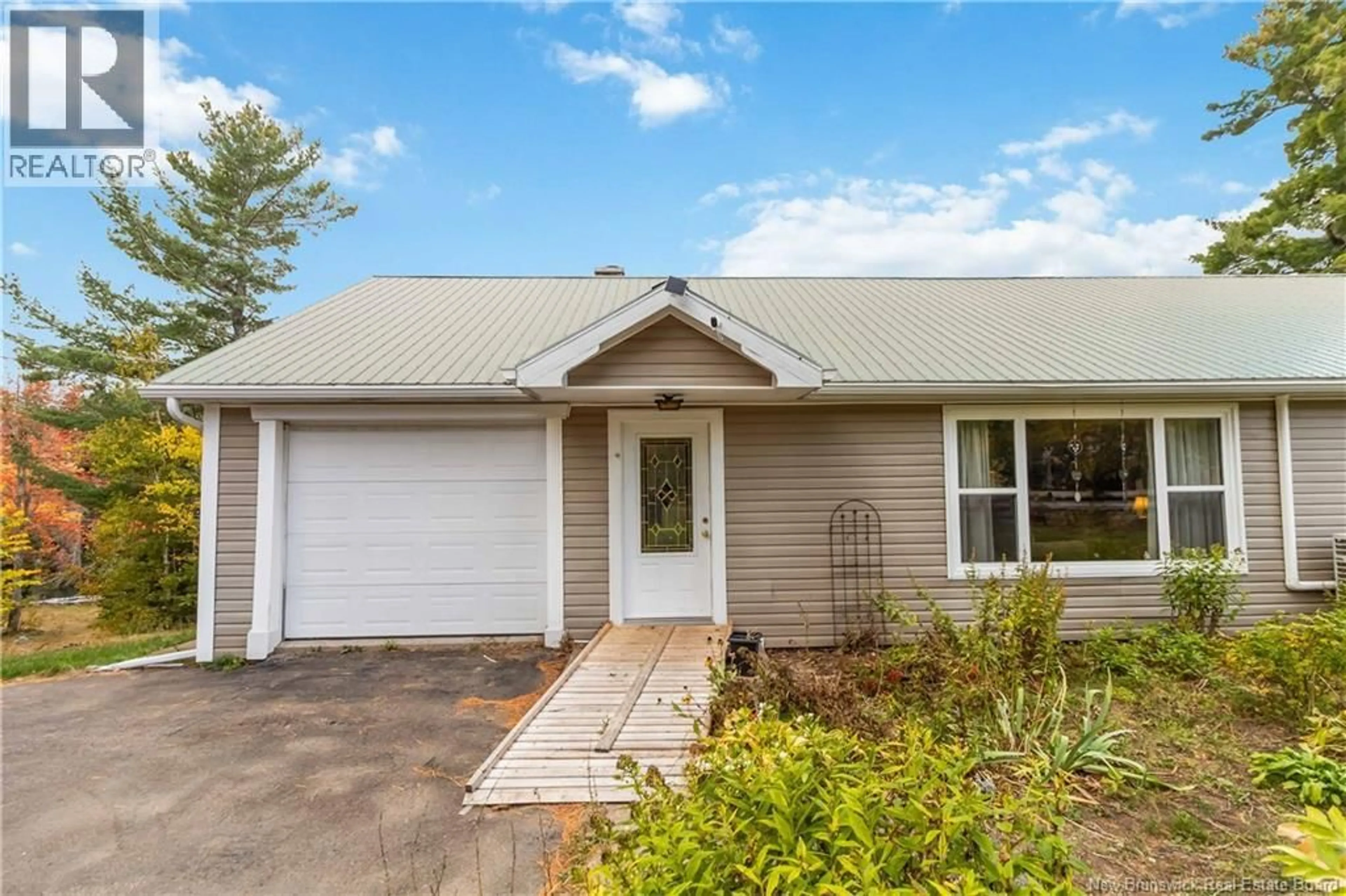 Home with vinyl exterior material, street for 3182 ROUTE 895, Elgin New Brunswick E4Z2S1