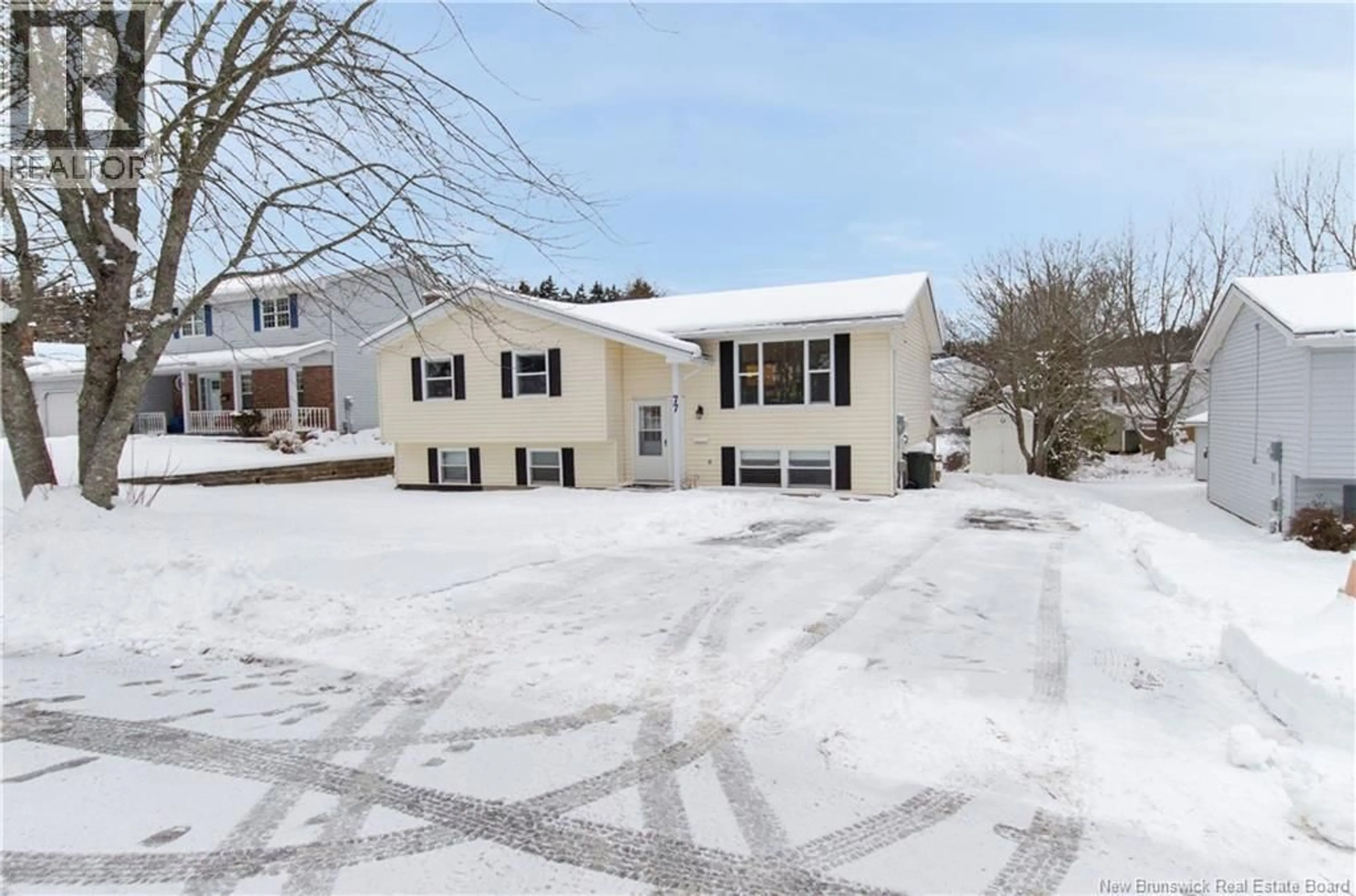 A pic from outside/outdoor area/front of a property/back of a property/a pic from drone, street for 77 SANDALWOOD CRESCENT, Saint John New Brunswick E2M5L2