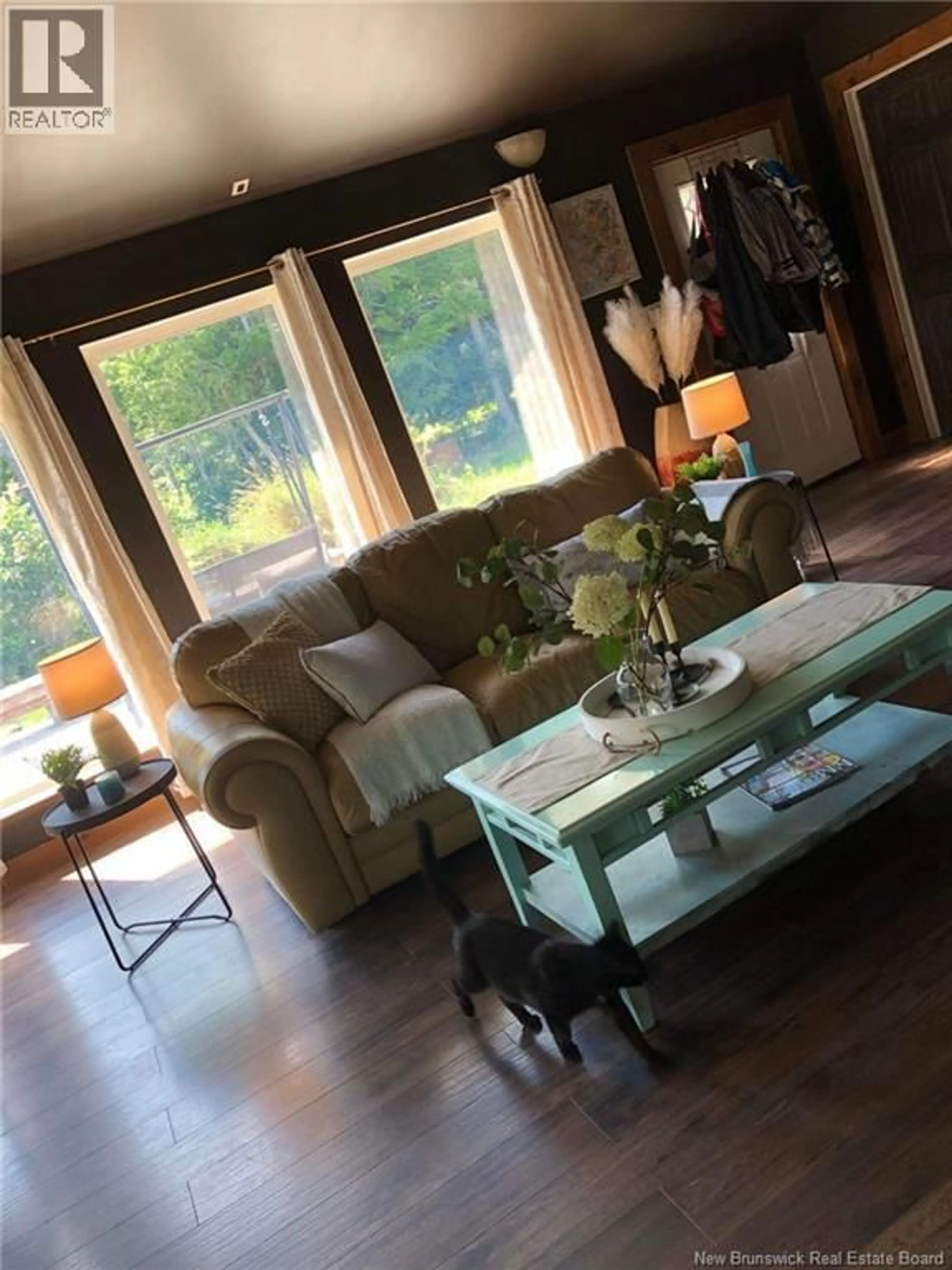 Living room with furniture, wood/laminate floor for 291 HAUT ST-ANTOINE, Sainte-Marie-De-Kent New Brunswick E4S1V6