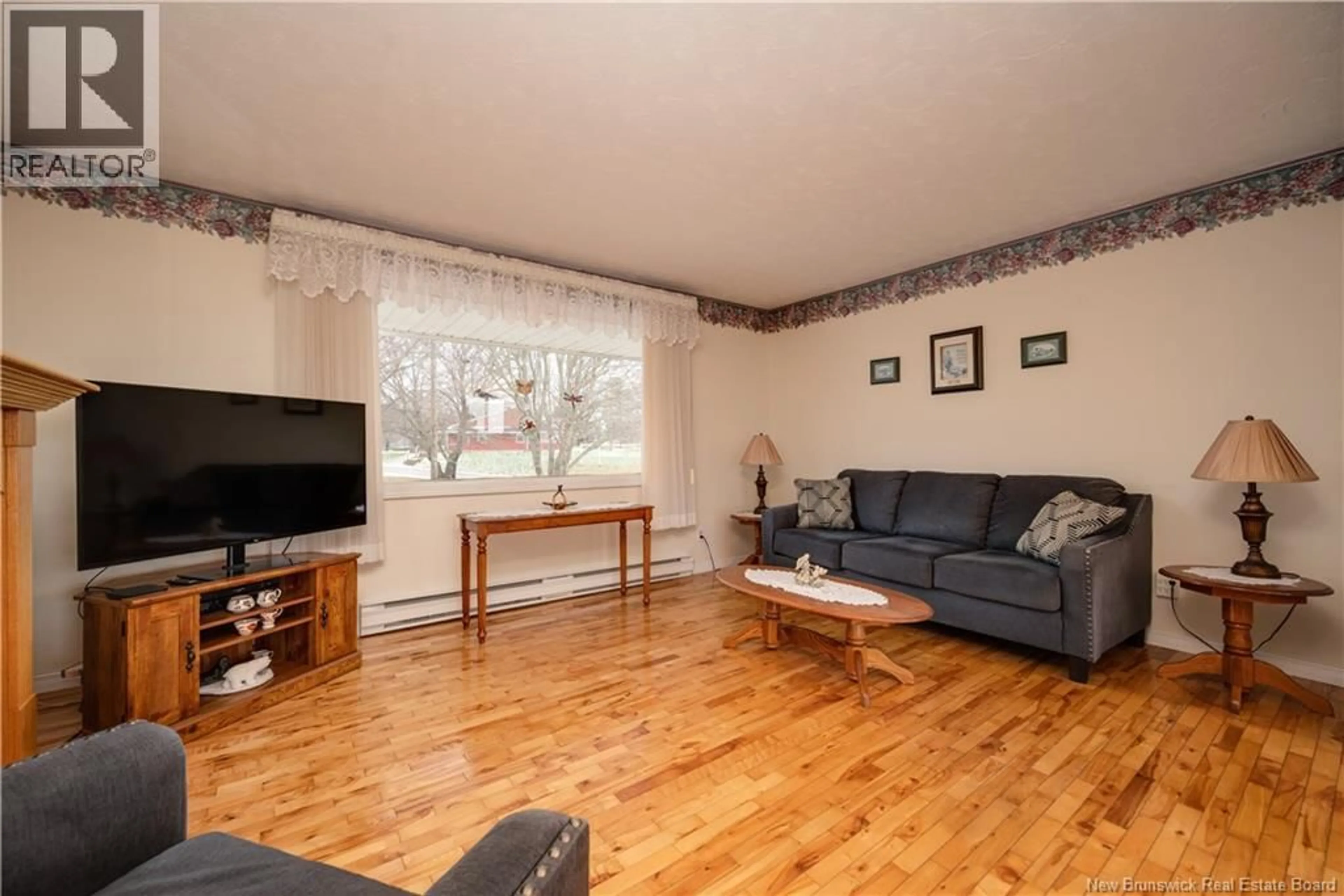 Living room with furniture, wood/laminate floor for 19 LEGION STREET, Hillsborough New Brunswick E4H2W7