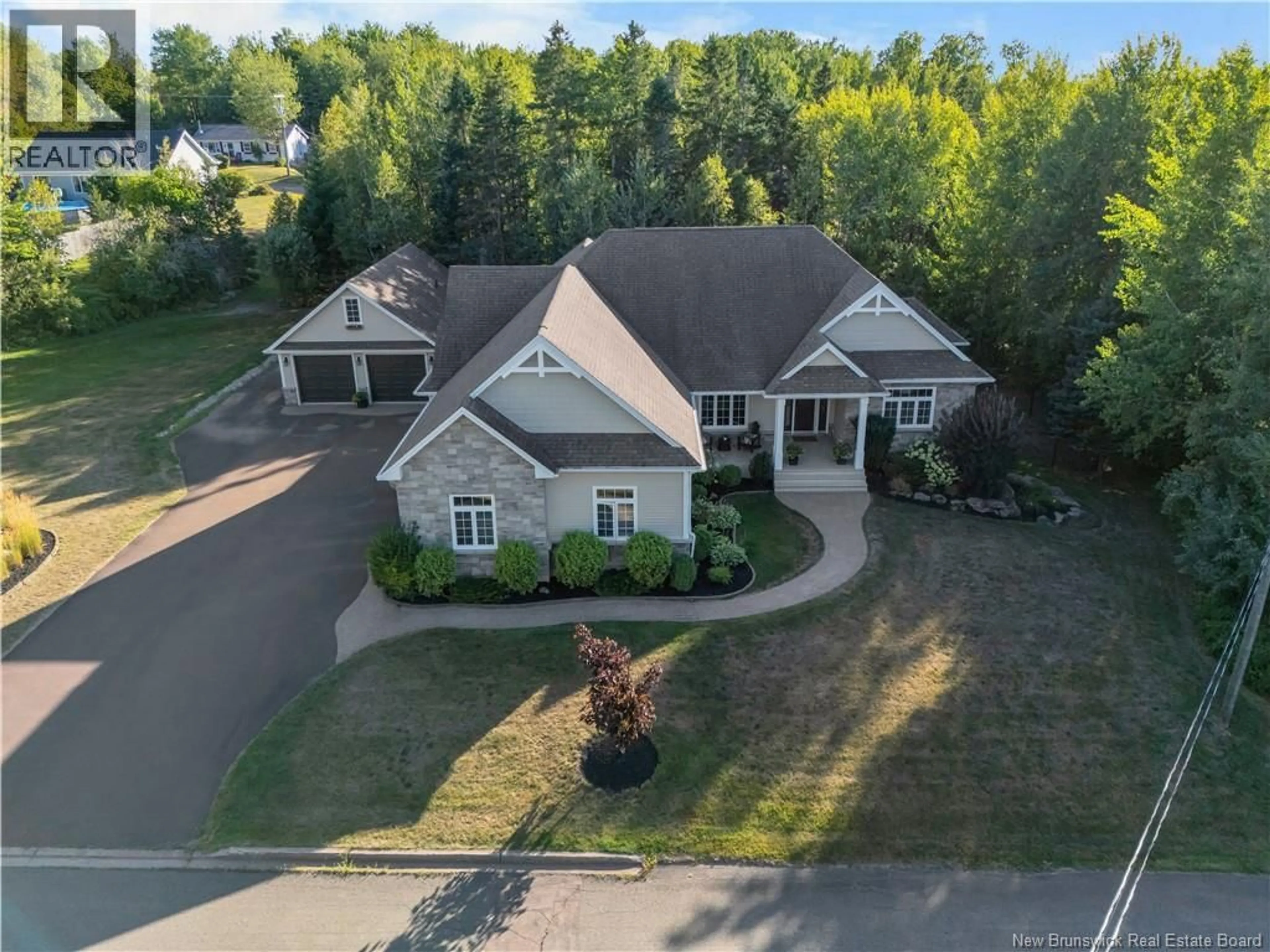 A pic from outside/outdoor area/front of a property/back of a property/a pic from drone, unknown for 132 GREENWICH DRIVE, Moncton New Brunswick E1A7B1