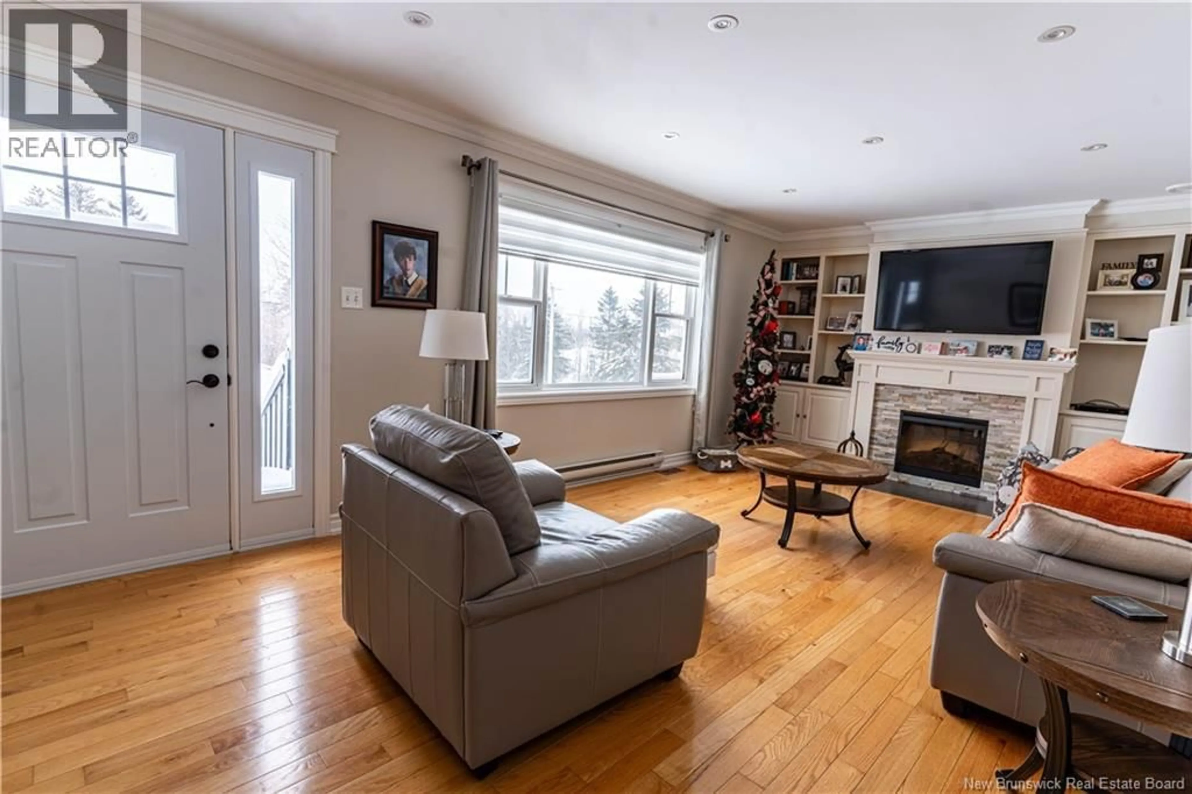 Living room with furniture, wood/laminate floor for 475L LITTLE BRANCH RD, Black River Bridge New Brunswick E1N5N2
